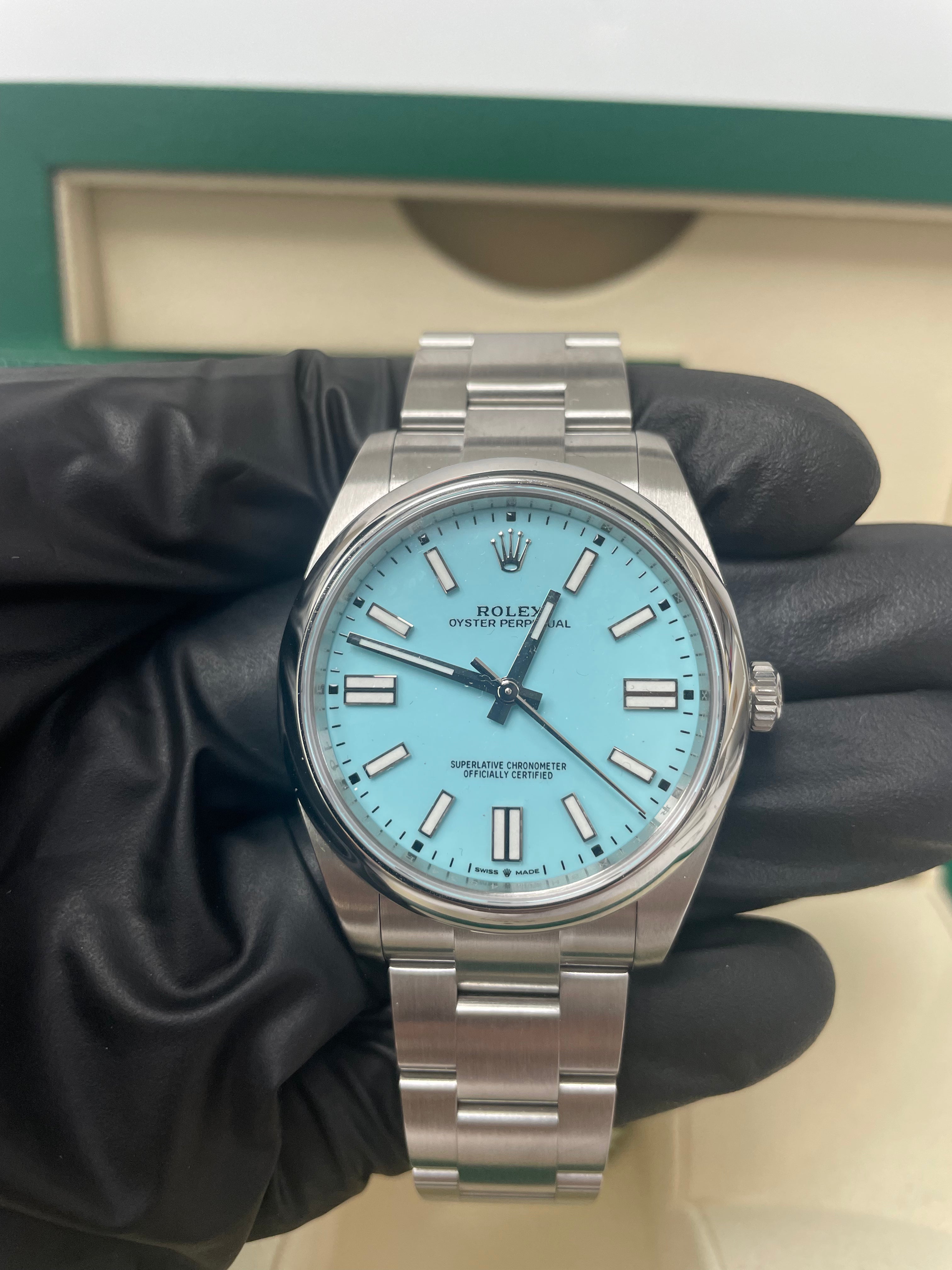 Rolex Oyster Perpetual 41mm Men's Watch - Stainless Steel Case, Turquoise Blue Dial, Oyster Bracelet (Ref# 124300) | Luxury Dress Watch for Business & Formal Occasions