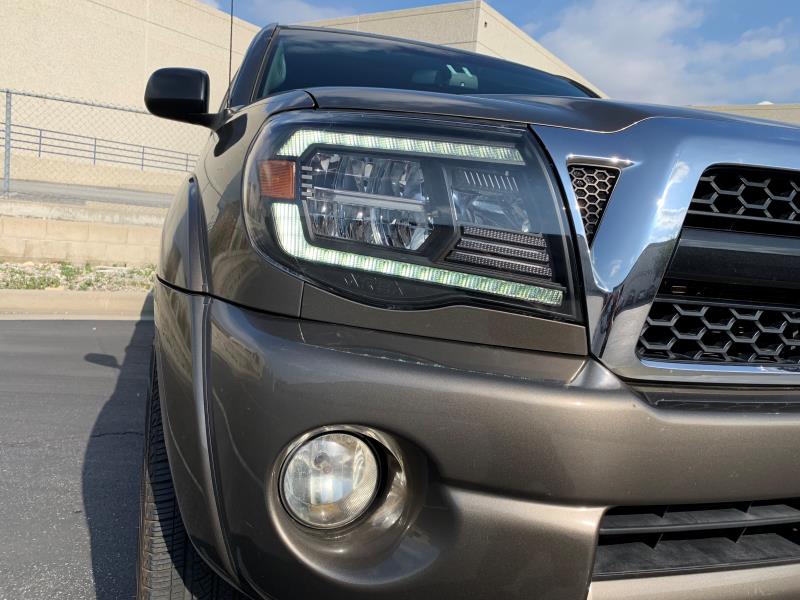 05-11 Toyota Tacoma LUXX Series LED Crystal Headlights - Black Housing High Performance Headlights for Improved Night Visibility | Perfect for Off-Roading & Night Driving