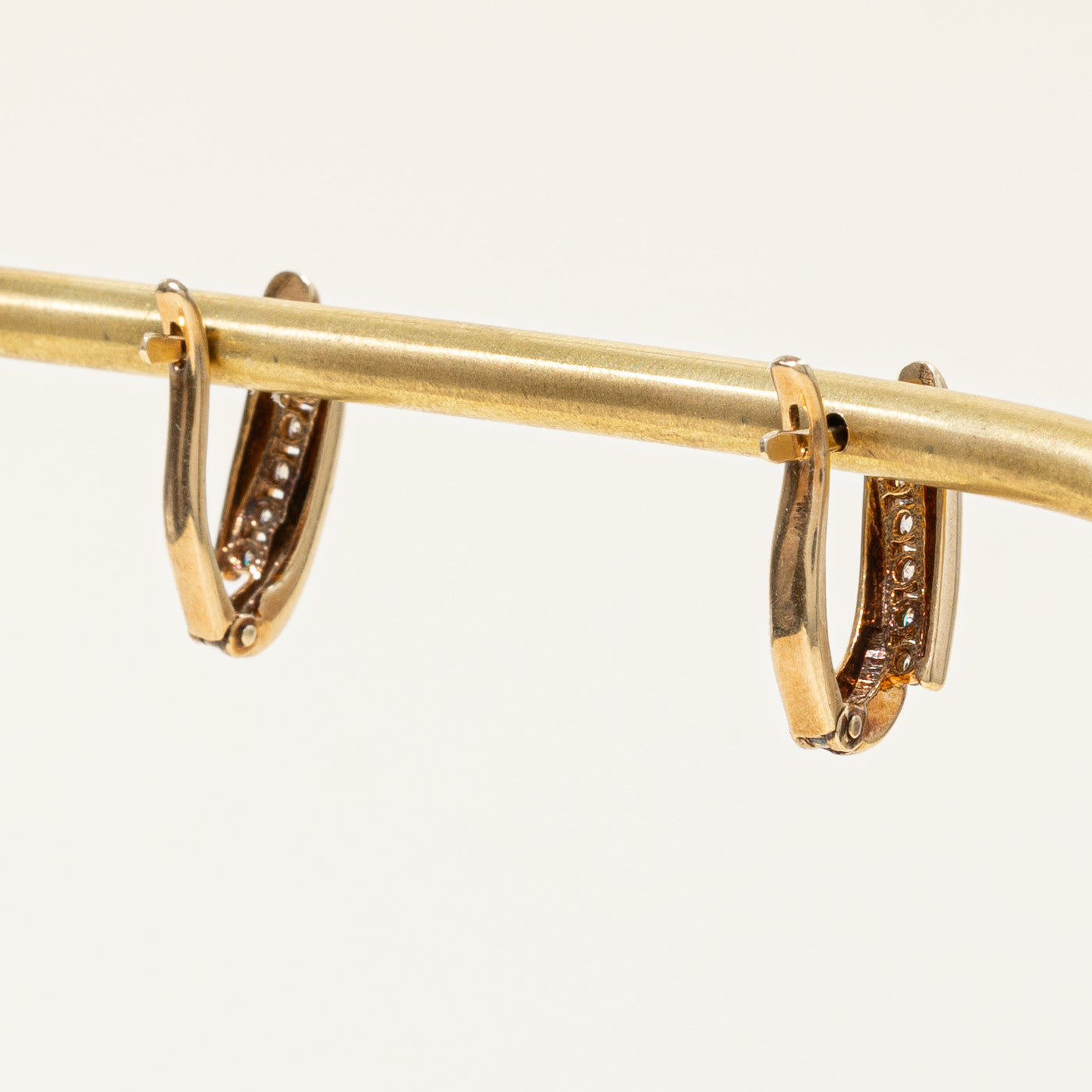 0.23ctw Diamond Oval Huggie Earrings for Women - 14K Gold Hoop Earrings for Everyday Wear & Special Occasions