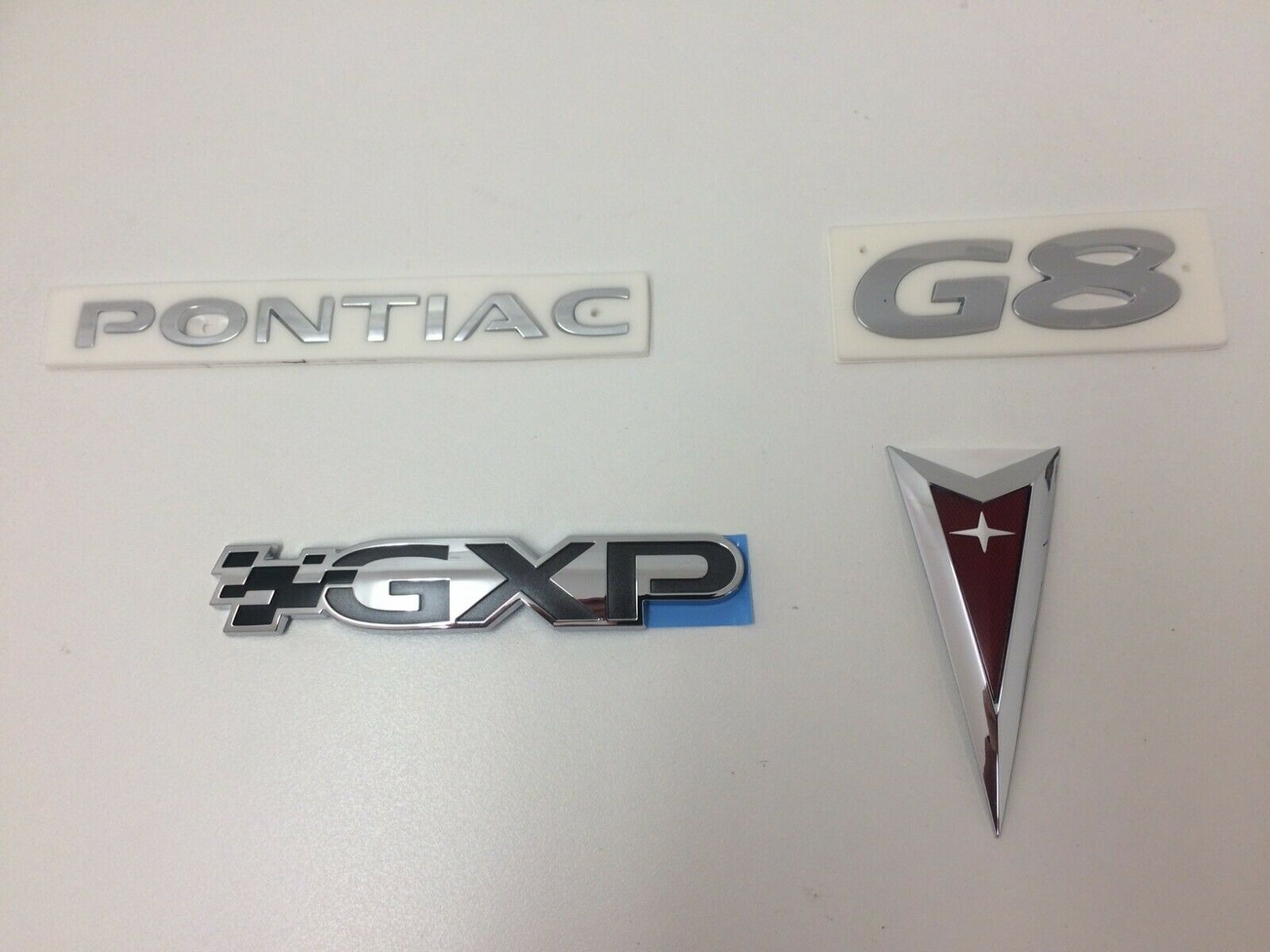 Genuine Pontiac G8 GXP 2007-2008 Trunk Emblem Set - Authentic P Logo Badges for Rear Decklid - Perfect for Restoration & Customization Projects