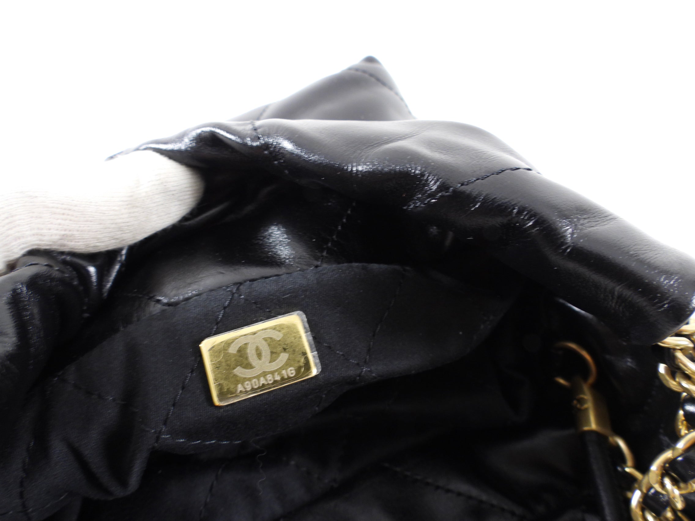 Chanel 2023 Black Leather Chain 22 Mini Bag with Ivory Enamel Logo - Luxury Designer Handbag for Women, Perfect for Evening Parties & Date Nights