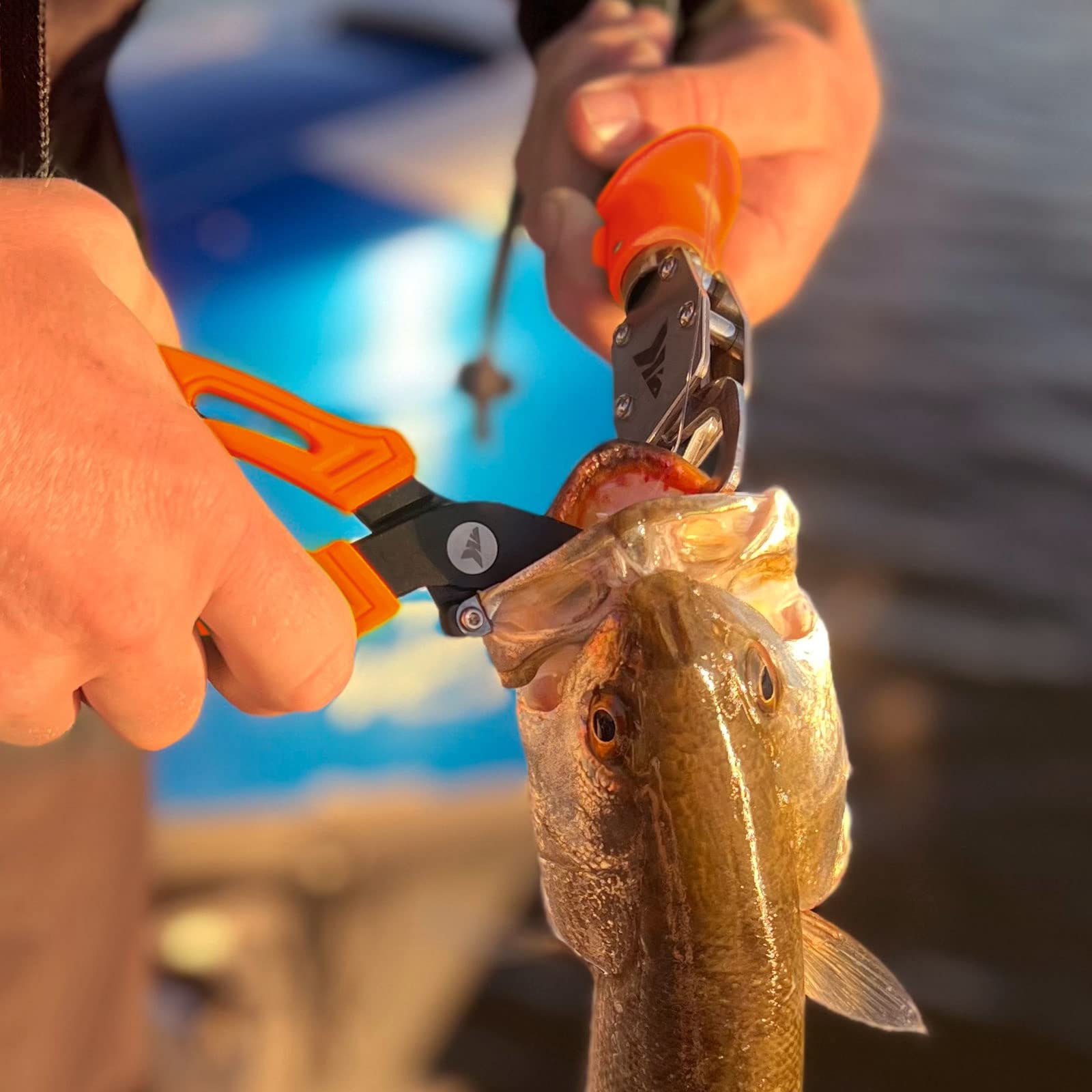 **KastKing Saltwater Resistant Fishing Pliers & Lip Gripper Combo – Durable Fishing Gear with Rubber Handle, Lanyard, Line Cutter, Hook Remover & Sheath – Perfect for Ice Fishing, Freshwater & Saltwater Anglers – Great Gift for Men**    *(Use Cases: Ideal for catching bass, trout, or saltwater species; essential for removing hooks, cutting lines, and handling fish safely during ice fishing or boat trips.)*
