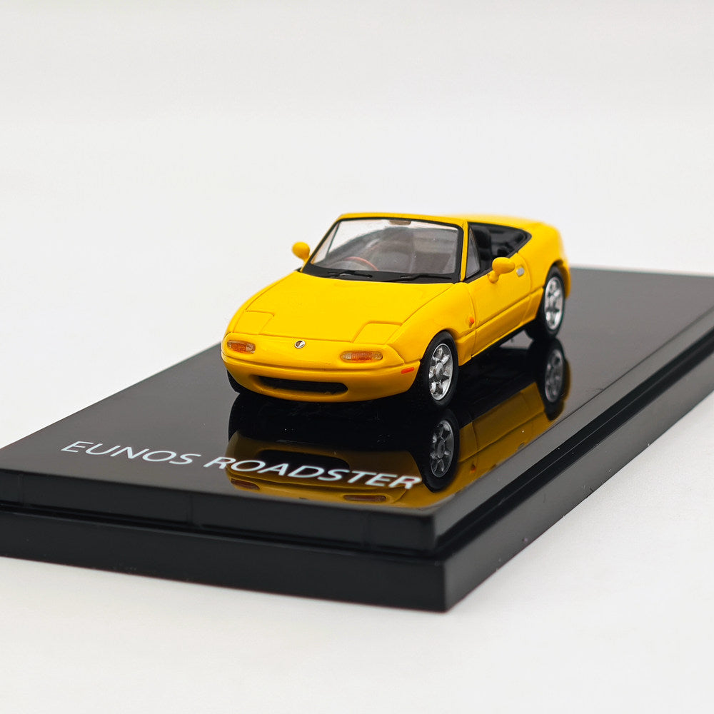 1/64 Scale Mazda Eunos Roadster NA6CE Diecast Model Car with Tonneau Cover - Limited Edition Yellow HJ642025BY - Collectible Hobby Japan Toy for Car Enthusiasts & Gift Ideas - Perfect for Display, Racing Scenes & Diecast Collections
