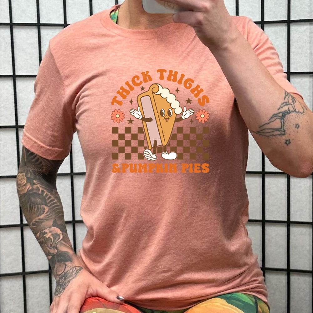 Thick Thighs & Pumpkin Pies Unisex T-Shirt - Funny Fall Graphic Tee for Women & Men - Perfect for Thanksgiving, Autumn Outfits and Seasonal Parties