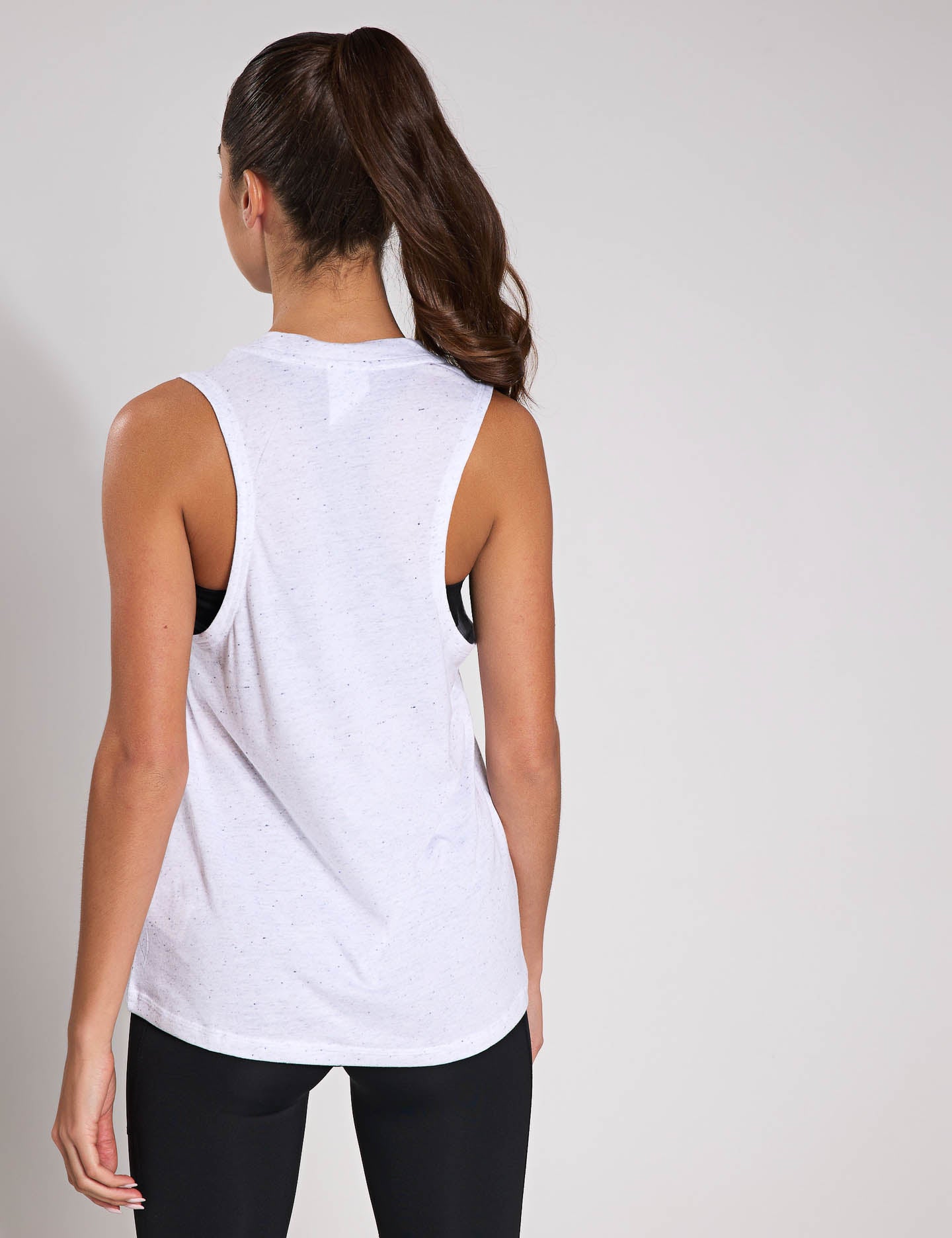 Essentials Winners Tank Top for Men & Women - Comfortable White & Black Sleeveless Shirt for Gym, Workout, and Casual Wear