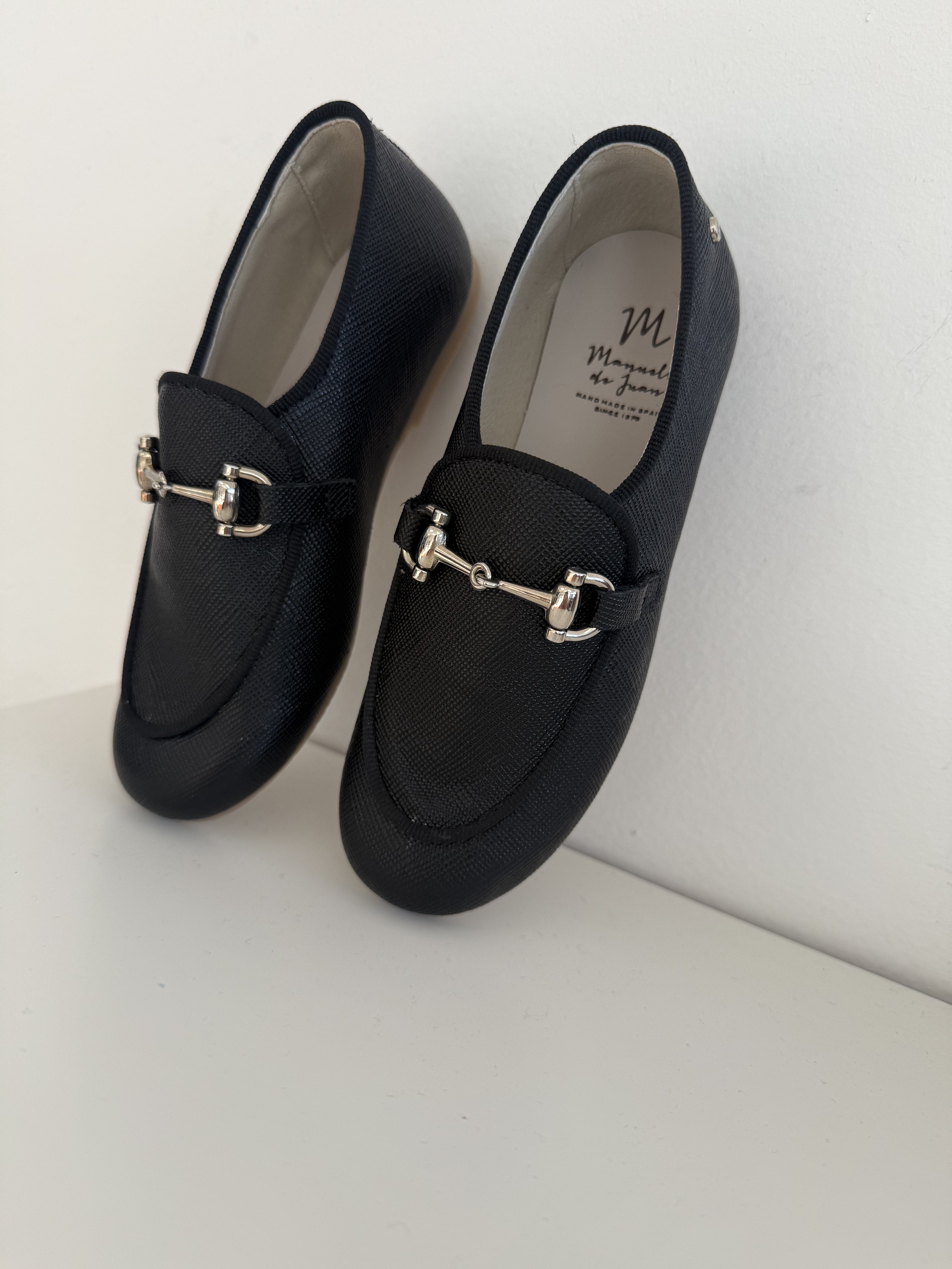 Manuela Black Textured Buckle Loafers for Women - Comfortable Slip-On Dress Shoes for Office, Business & Casual Wear