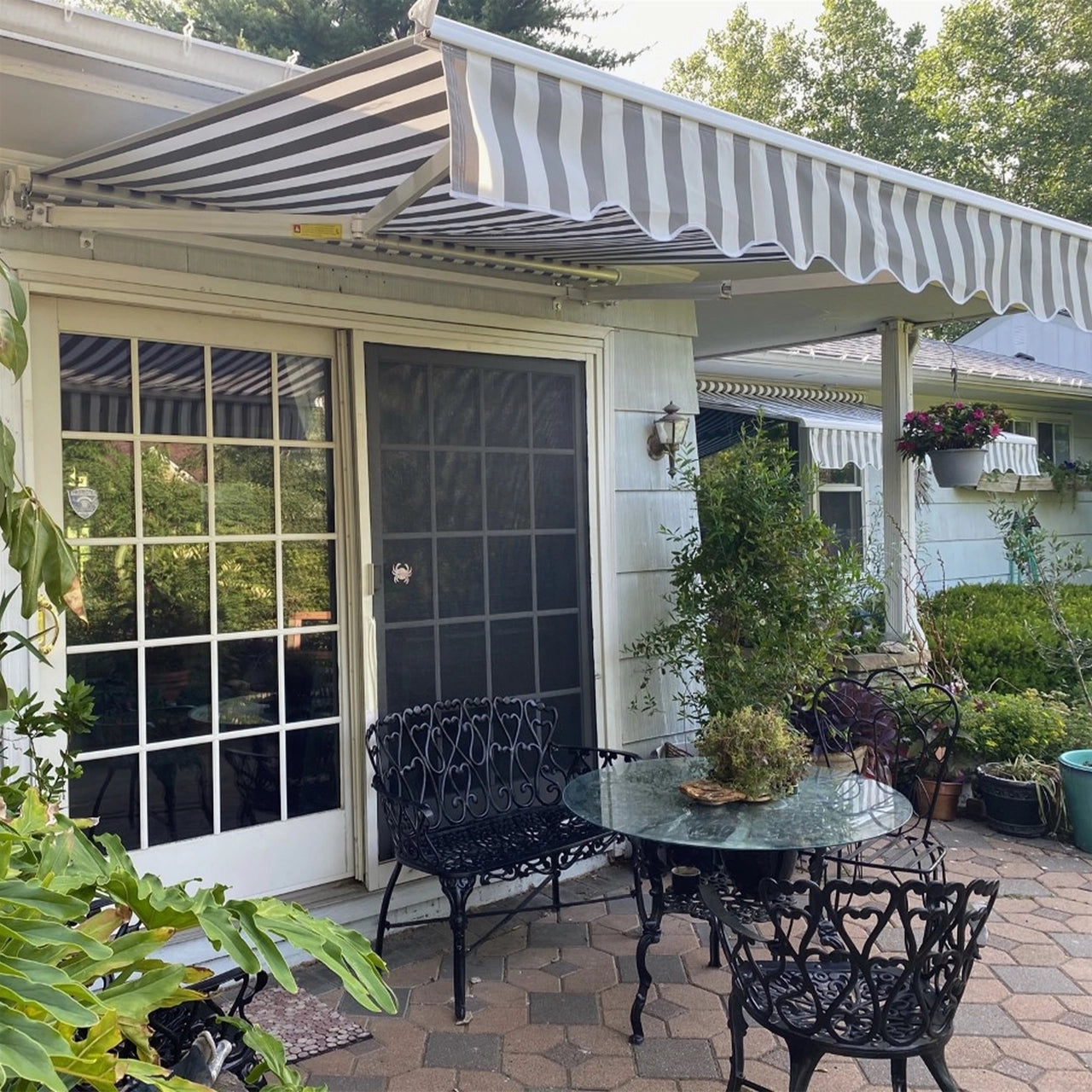 Aleko 16x10 Feet Motorized Retractable Patio Awning - White Frame with Gray & White Stripes for Outdoor Shade & Backyard Relaxation