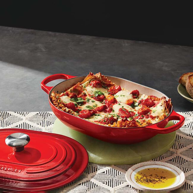 Le Creuset 3.4L Oblong Casserole Dish - Cerise Red Enameled Cast Iron Dutch Oven for Baking, Roasting & Serving | Perfect for Family Dinners, Holiday Meals & Entertaining Guests