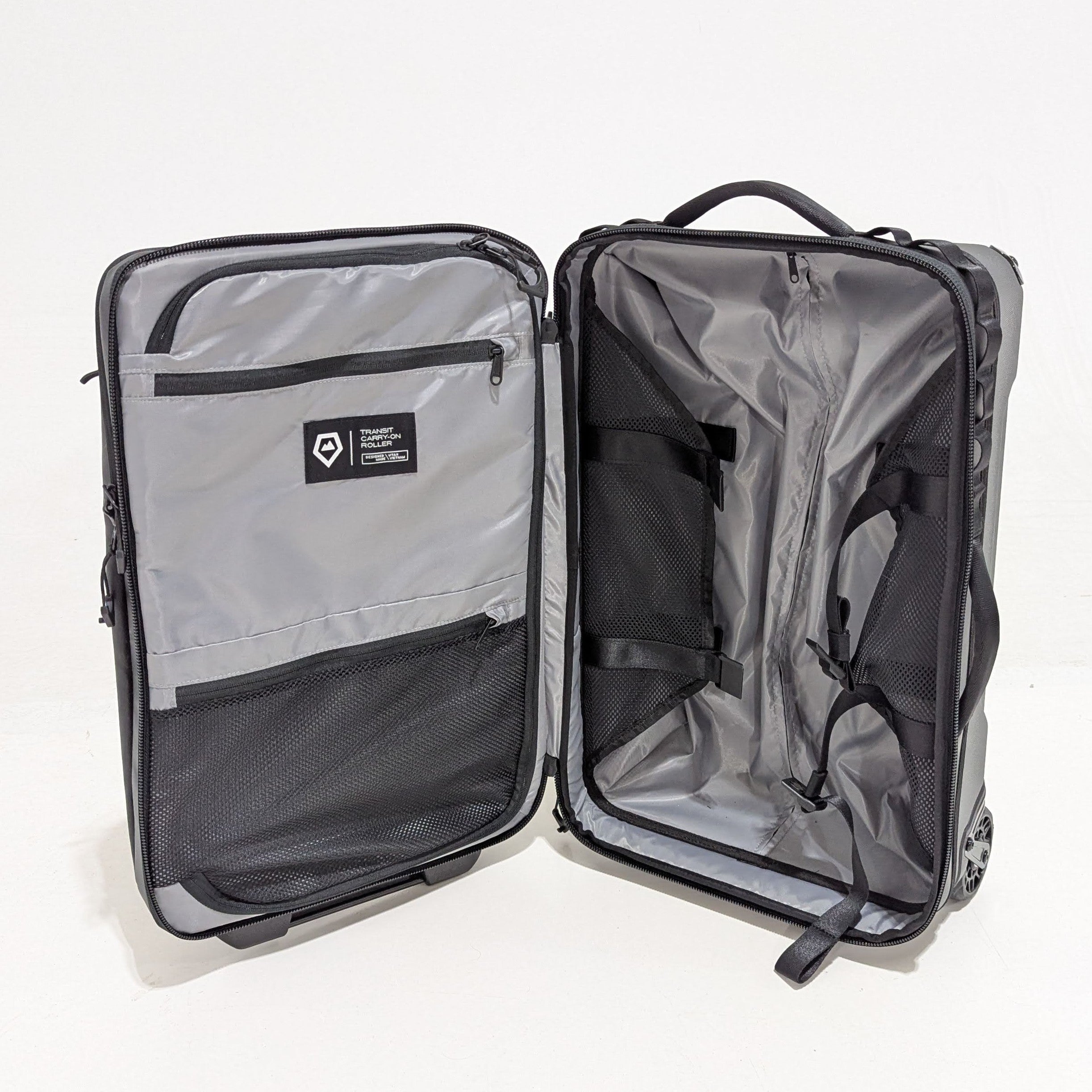 WANDRD Transit Carry On Roller Bag 40L - Black | Premium Used Luggage for Travel & Business Trips | Durable Spinner Suitcase with Smooth Wheels