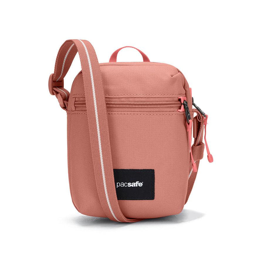 PACSAFE Go Micro Crossbody Bag - Anti-Theft Travel Purse for Women, RFID Blocking, Lightweight & Secure - Perfect for Commuting, Shopping, and Travel Accessories (Rose)