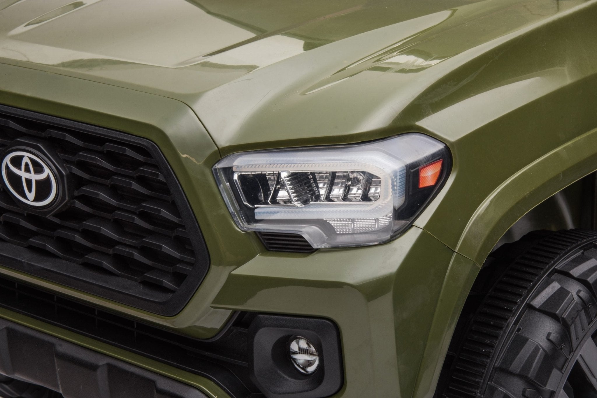 12V Toyota Olive Green Ride On Pickup Truck for Kids - Remote Control, MP3/FM Player, Leather Seat - Electric Toy Car for Boys & Girls - Perfect for Indoor & Outdoor Play - SKU 7109066