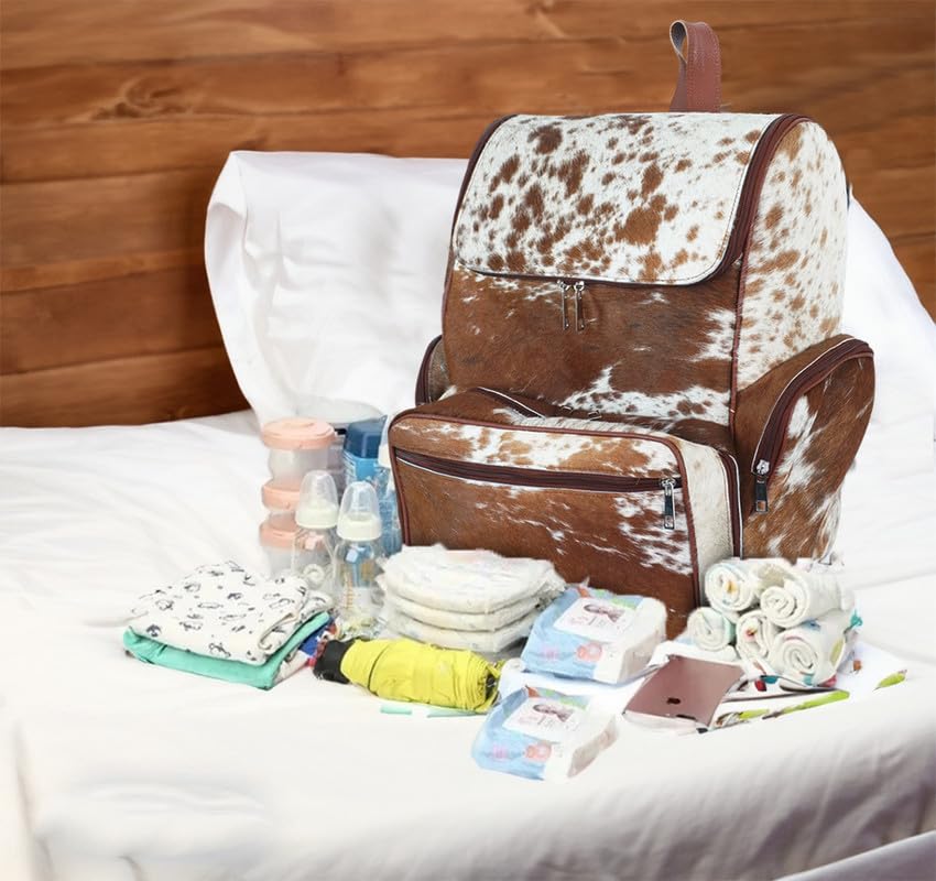 Western Cowhide Print Leather Diaper Backpack for Women - Large Travel Baby Bag with Multiple Pockets | Stylish Brown & White Design | Perfect Shower Gift for New Moms, Nursing & Travel Use