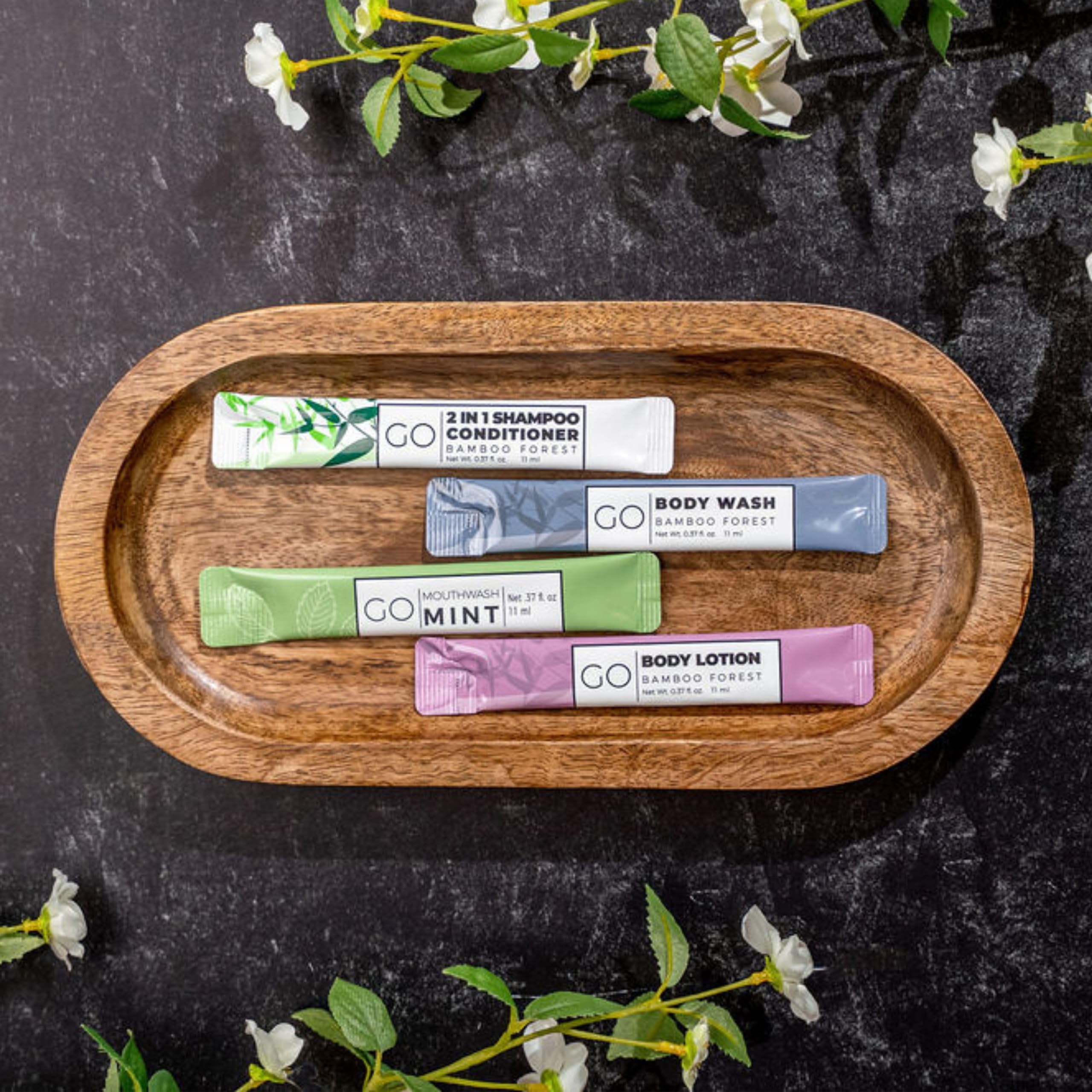GO Essentials - Travel Size Toiletries Kit for Men & Women | Shampoo, Conditioner, Body Wash, Lotion & Mouthwash Set | Perfect for Hotels, Air Travel & Guest Bathroom Supplies