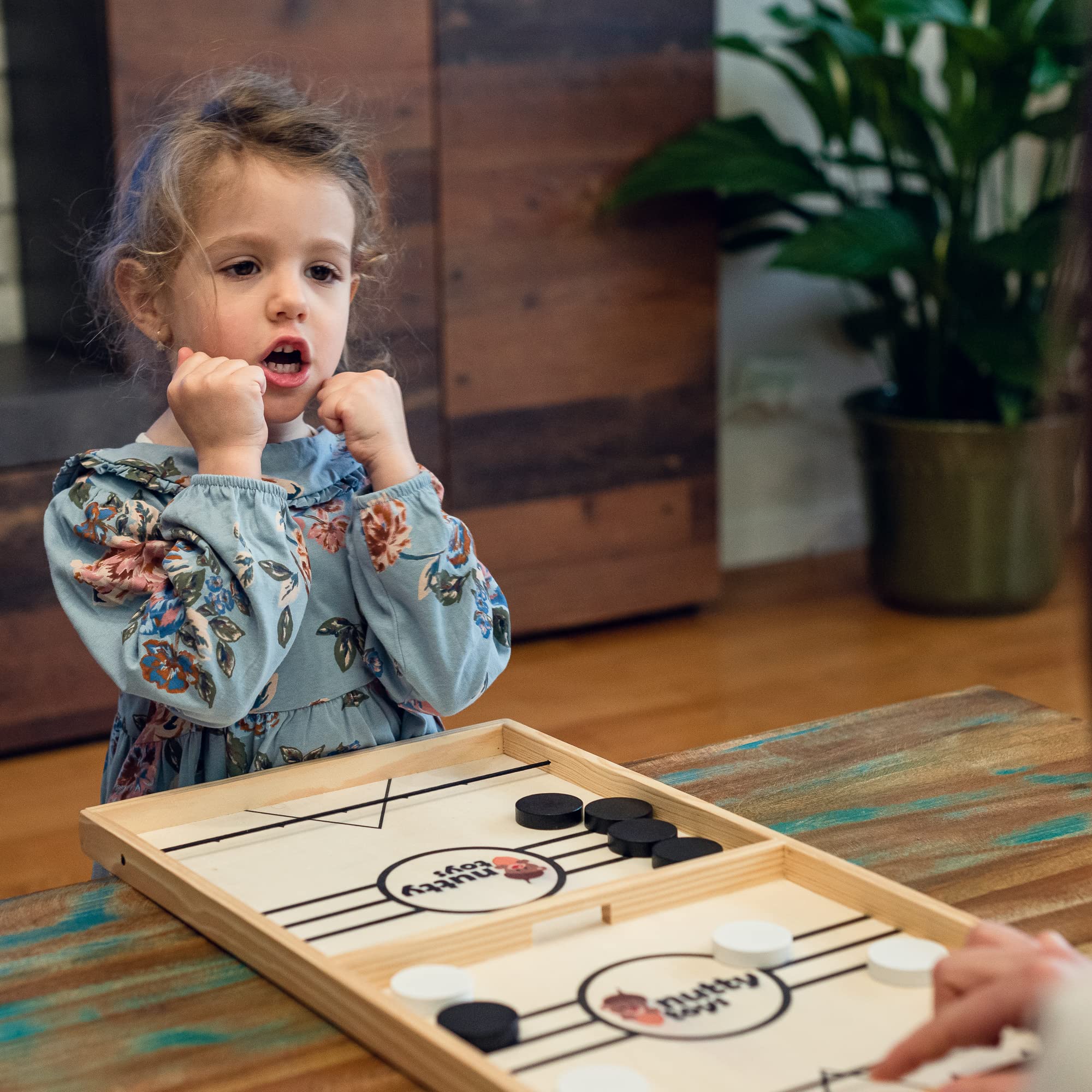 Nutty Toys Sling Puck Family Game XL - Fast Action Tabletop Battle Game for Kids, Teens & Adults - Perfect for Easter Basket Stuffers, Birthday Gifts & Family Game Night Fun
