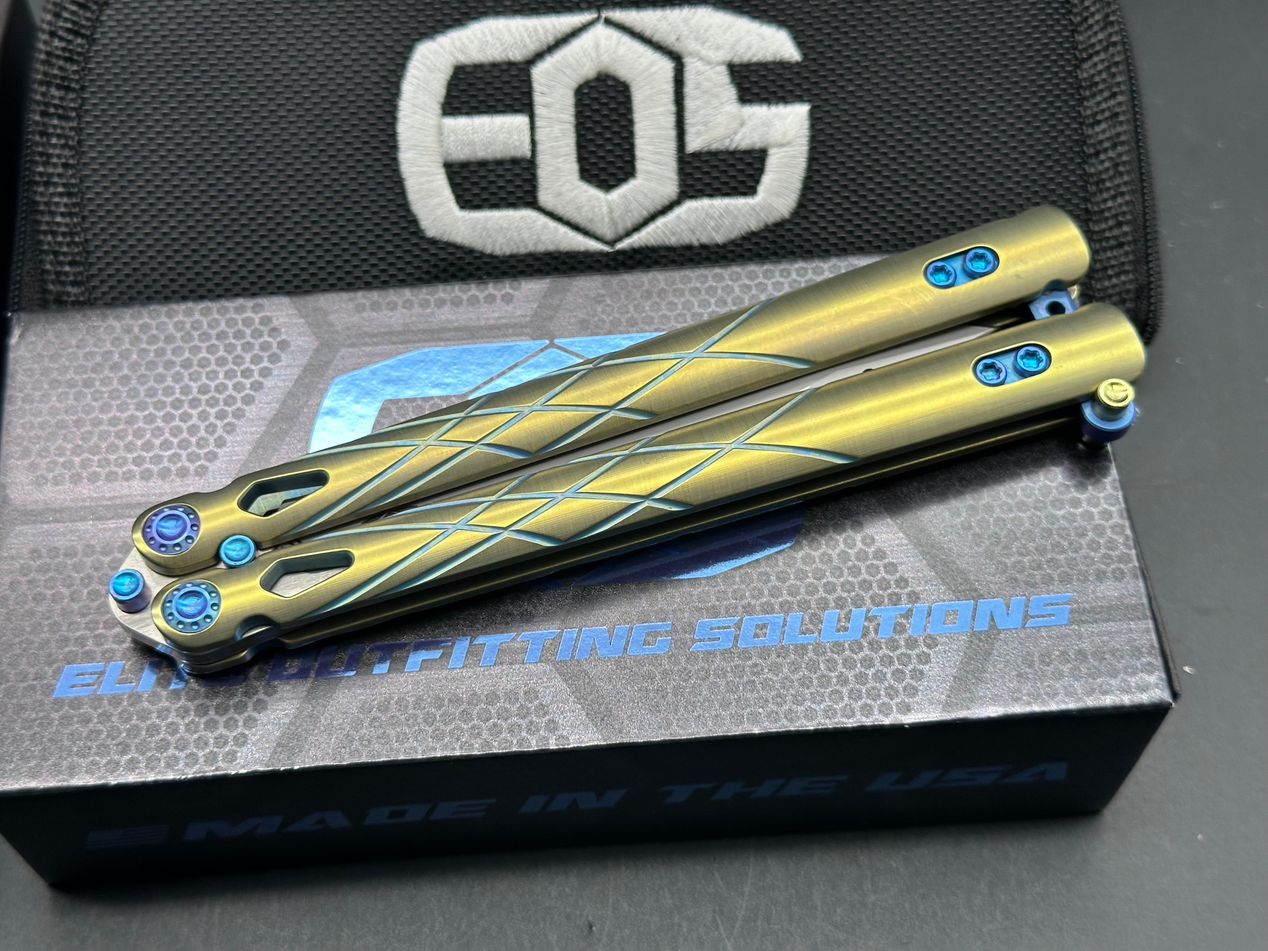 Premium EOS Villian Balisong Butterfly Knife - Gold Titanium Handles, Blue Latch Hardware, Recurve Tanto Blade in Sasha Satin CPM S30V Steel | Perfect for Collectors, EDC Carry & Tactical Enthusiasts