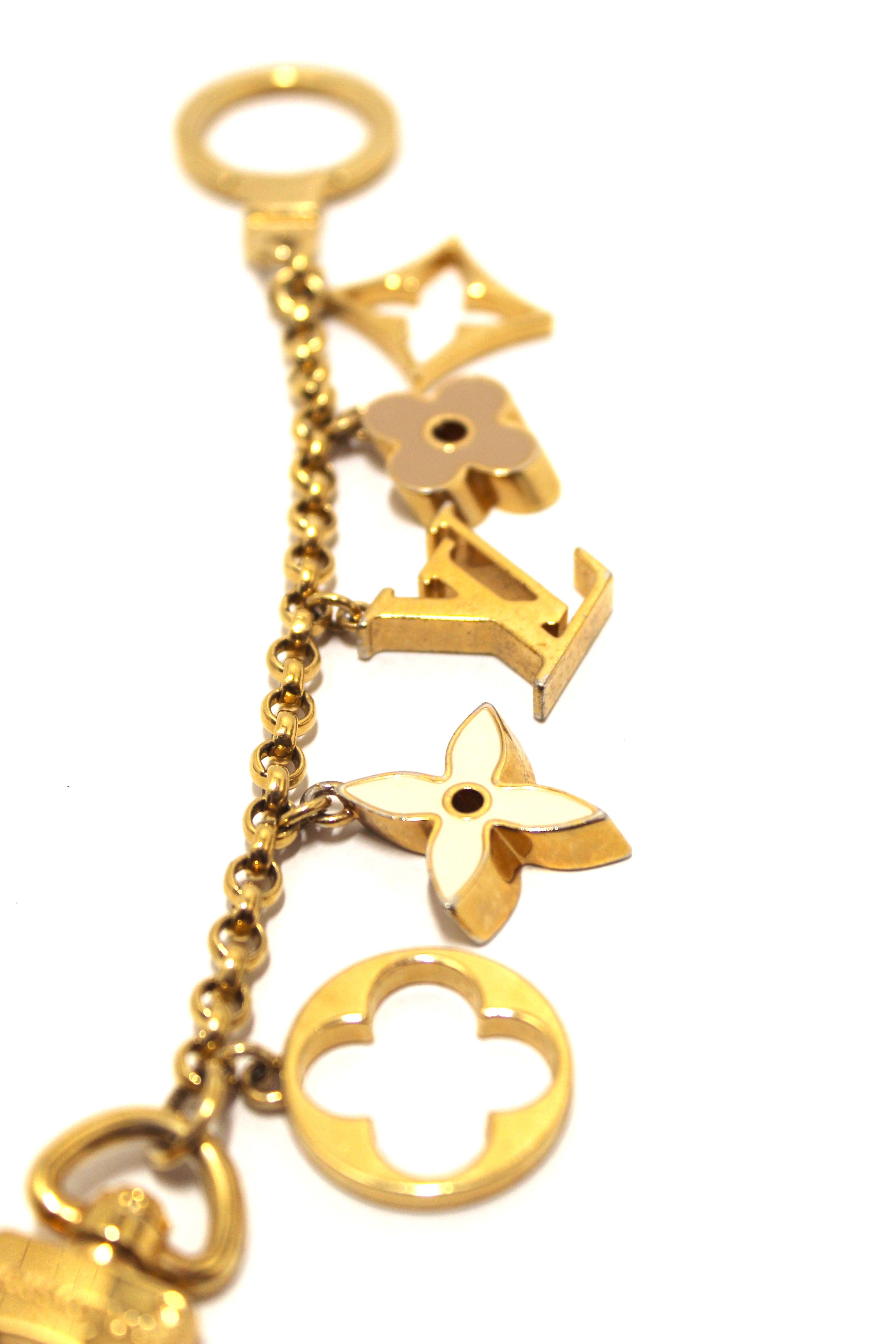 Authentic Louis Vuitton Fleur de Monogram Bag Charm Chain - Luxury Keychain for Handbags, Wallets & Backpacks - Perfect Gift for Fashion Lovers & LV Enthusiasts