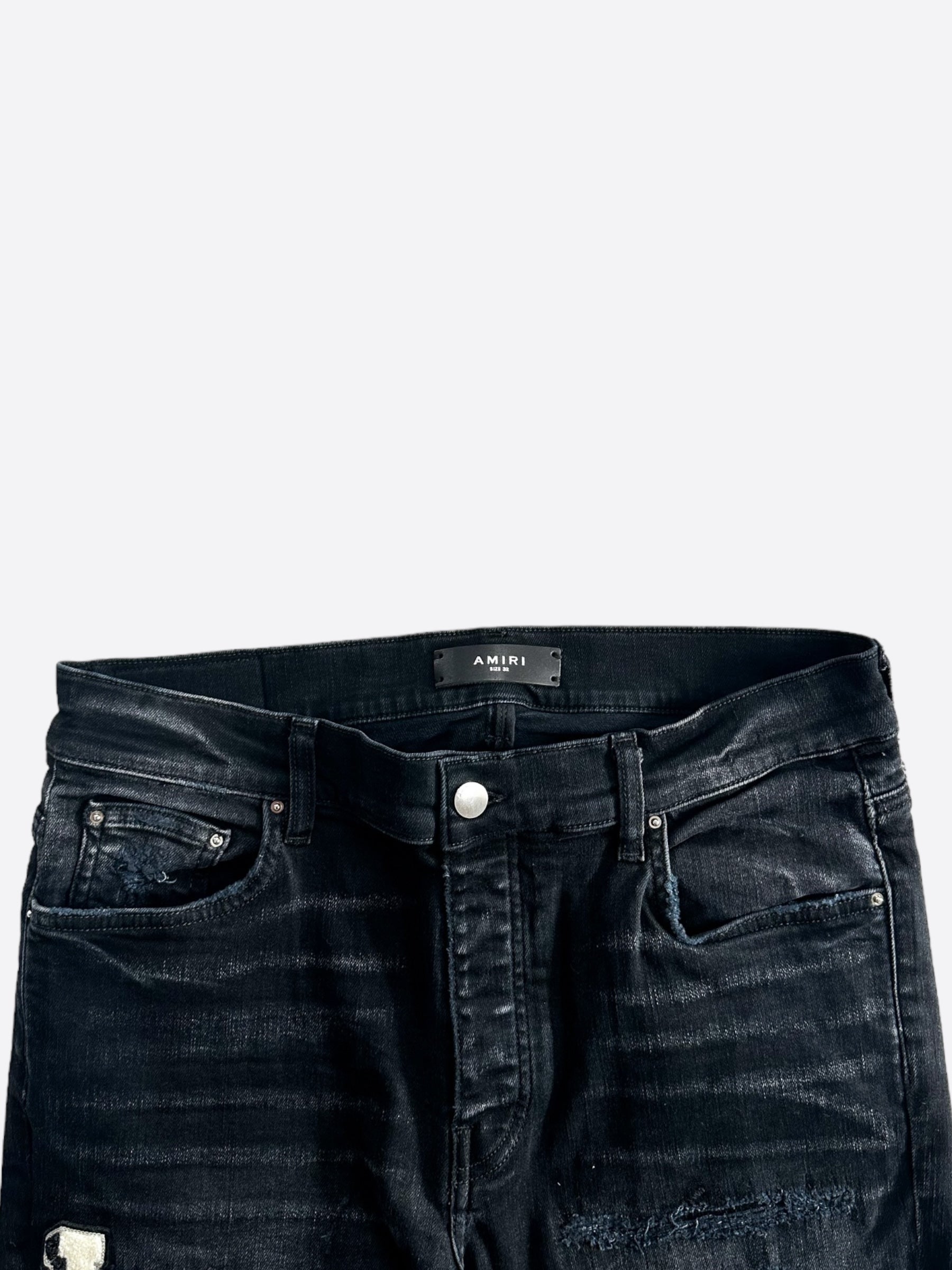 Amiri Faded Black & White Varsity Applique Distressed Jeans for Men - Vintage Style Ripped Denim Pants, Streetwear Fashion, Perfect for Casual Outfits & Night Out