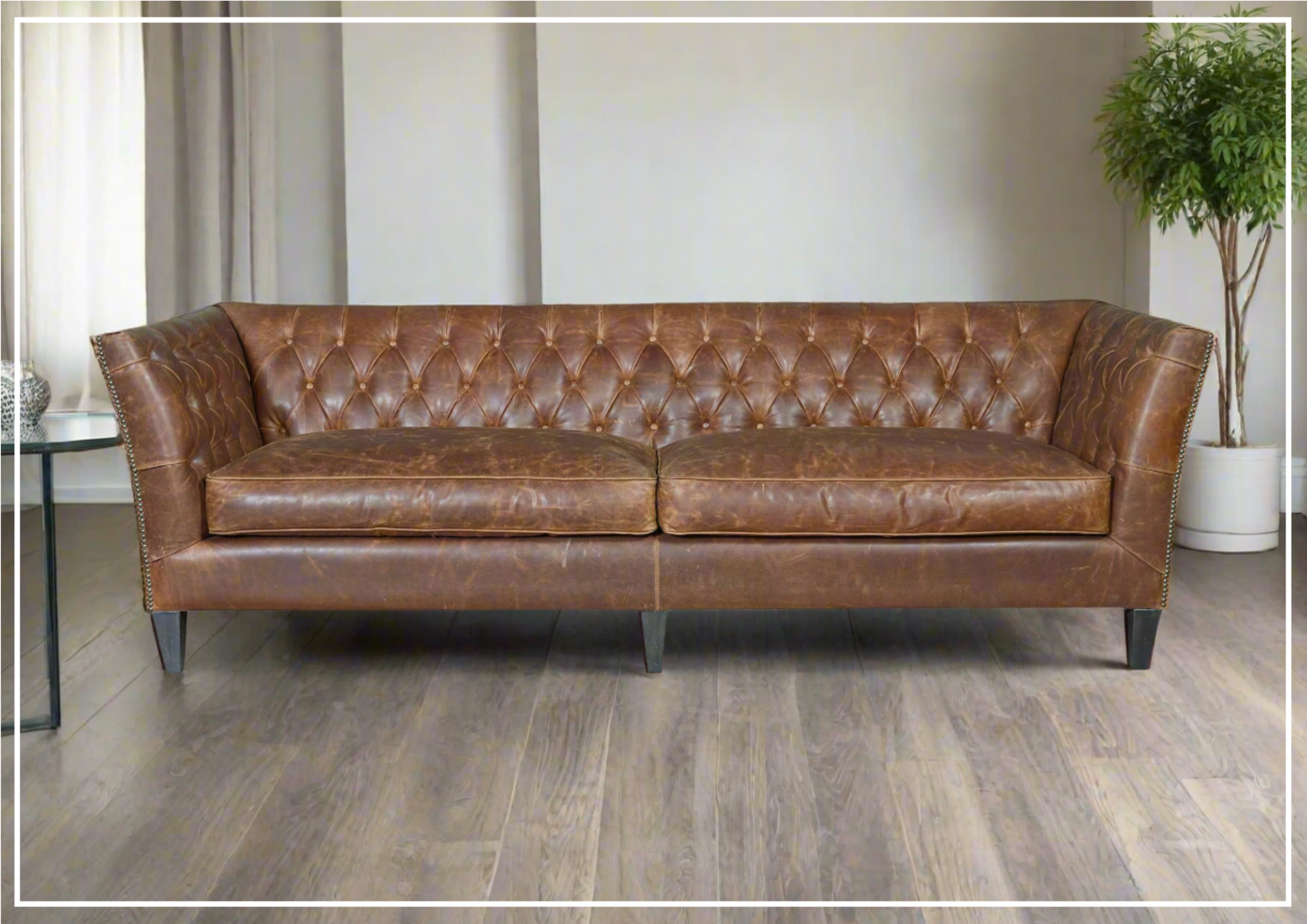 **Duncan 2-Seater Brown Leather Sofa with Tufted Back & Arms – Universal Furniture for Living Room & Office**    (优化说明：   1. 符合SEO规范，突出关键词如