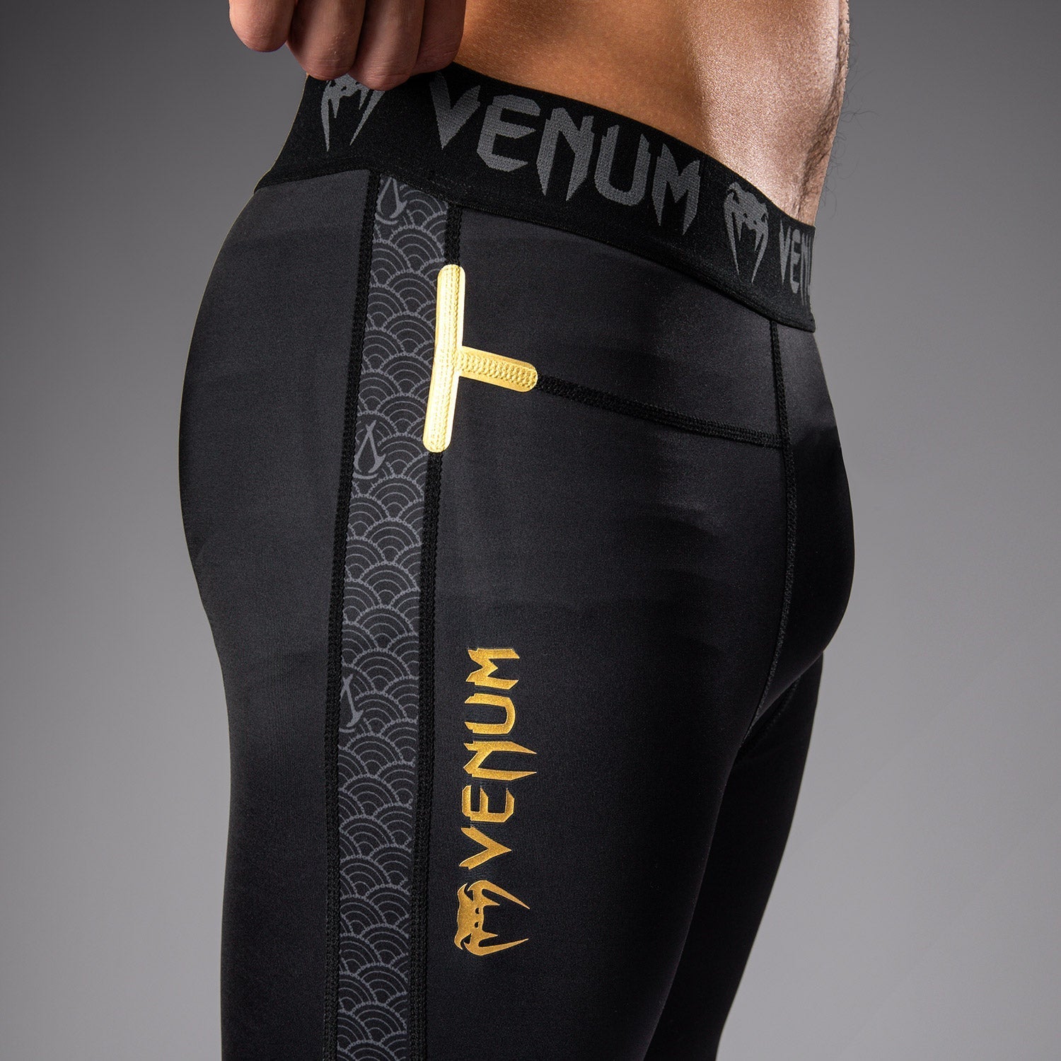 Venum x Assassin's Creed Shadows Spats - Black/Gold MMA Grappling Leg Sleeves for Training & Combat Sports