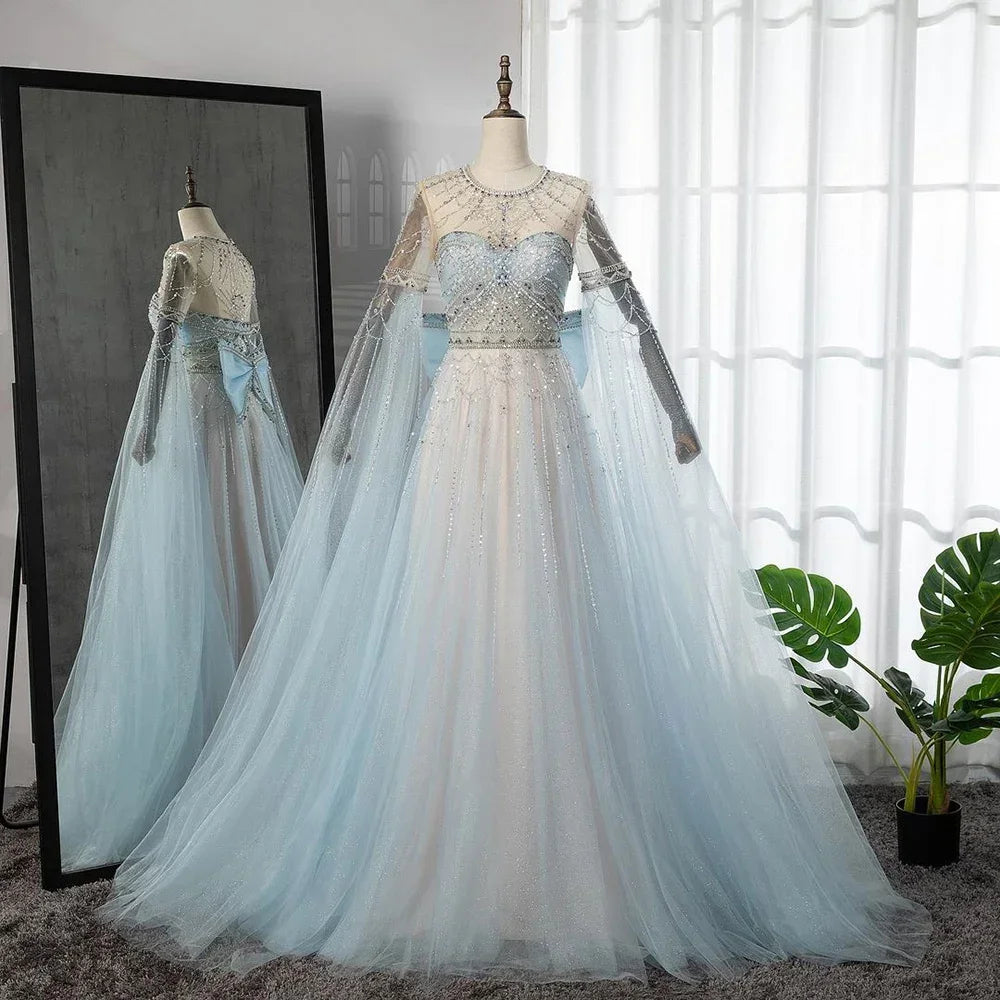 Elegant Blue A-Line Arabic Cape Sleeve Evening Gown with Beaded Bow Detail - Luxury Formal Dress for Women 2025 | Perfect for Weddings, Galas & Special Occasions