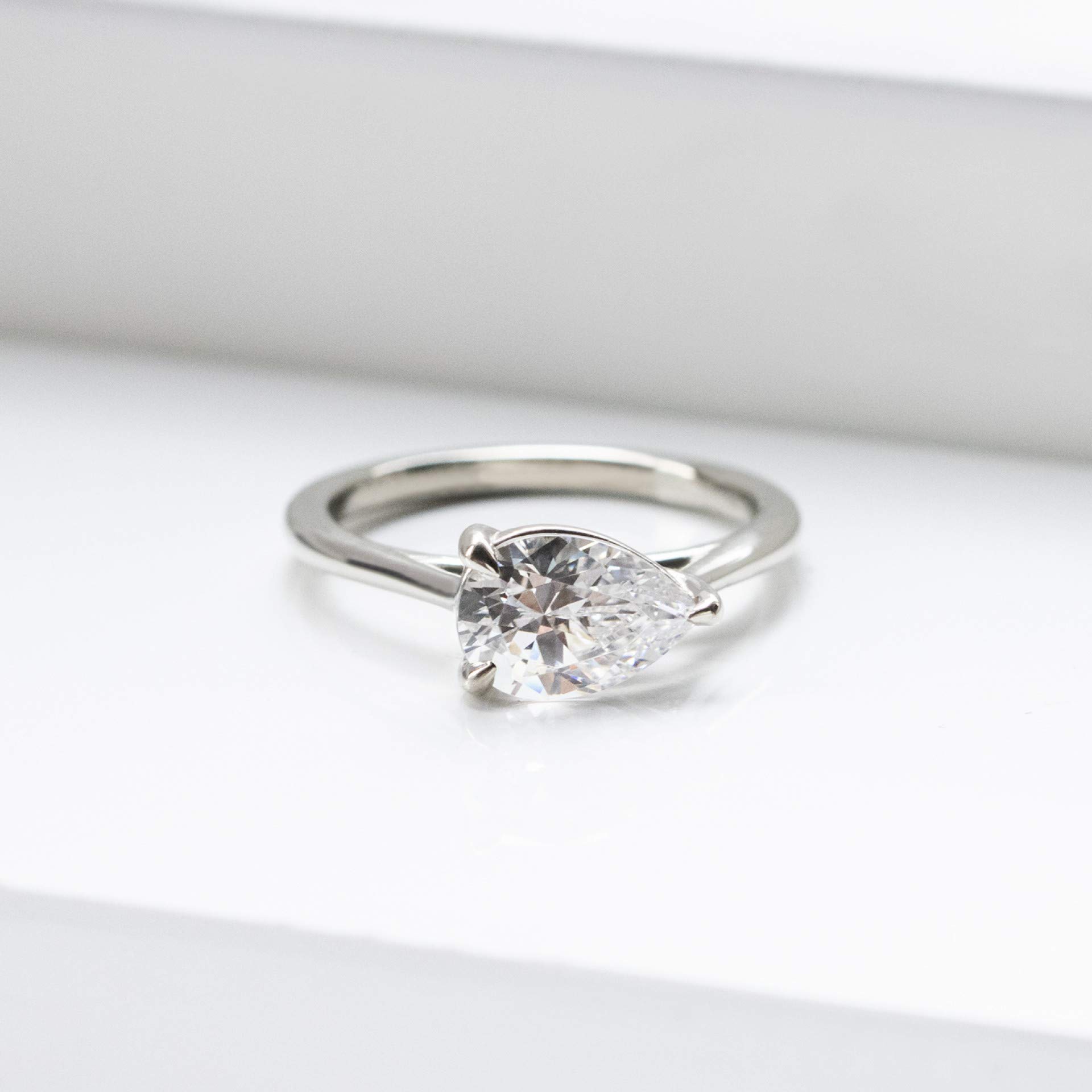 East West Classic Trellis Ring - 2.02CT Pear Cut VVS1 Colorless Moissanite Diamond in 925 Sterling Silver | Promise Ring, Engagement Ring, Wedding Gift for Her | Perfect for Anniversaries, Proposals & Special Occasions