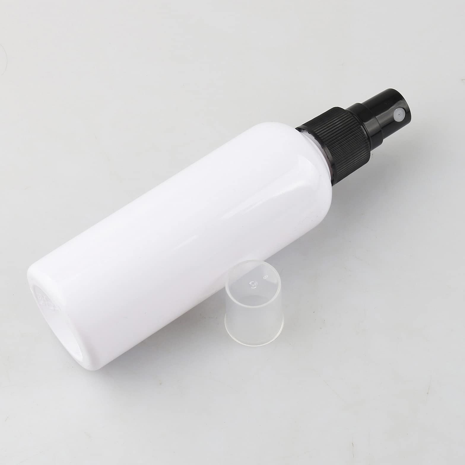 12 Pack 100ml Empty Fine Mist Plastic Spray Bottles - Travel Size Refillable Atomizer with Black Pump Head & 2 Funnels - Perfect for Cosmetics, Essential Oils, Hair Care & DIY Projects (Pink)