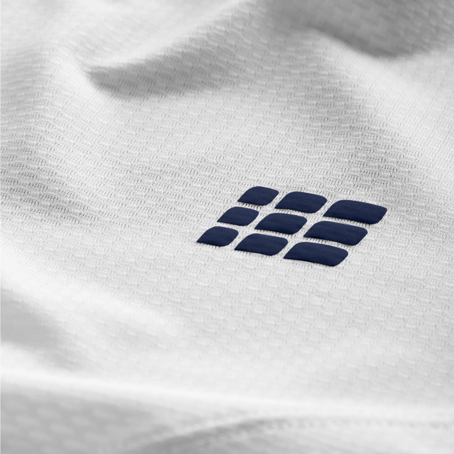 CEP Men's Performance Running Shirt - Moisture Wicking Round Neck Short Sleeve Athletic Top (White/Geometric Print) - Ideal for Jogging, Gym Workouts & Outdoor Sports