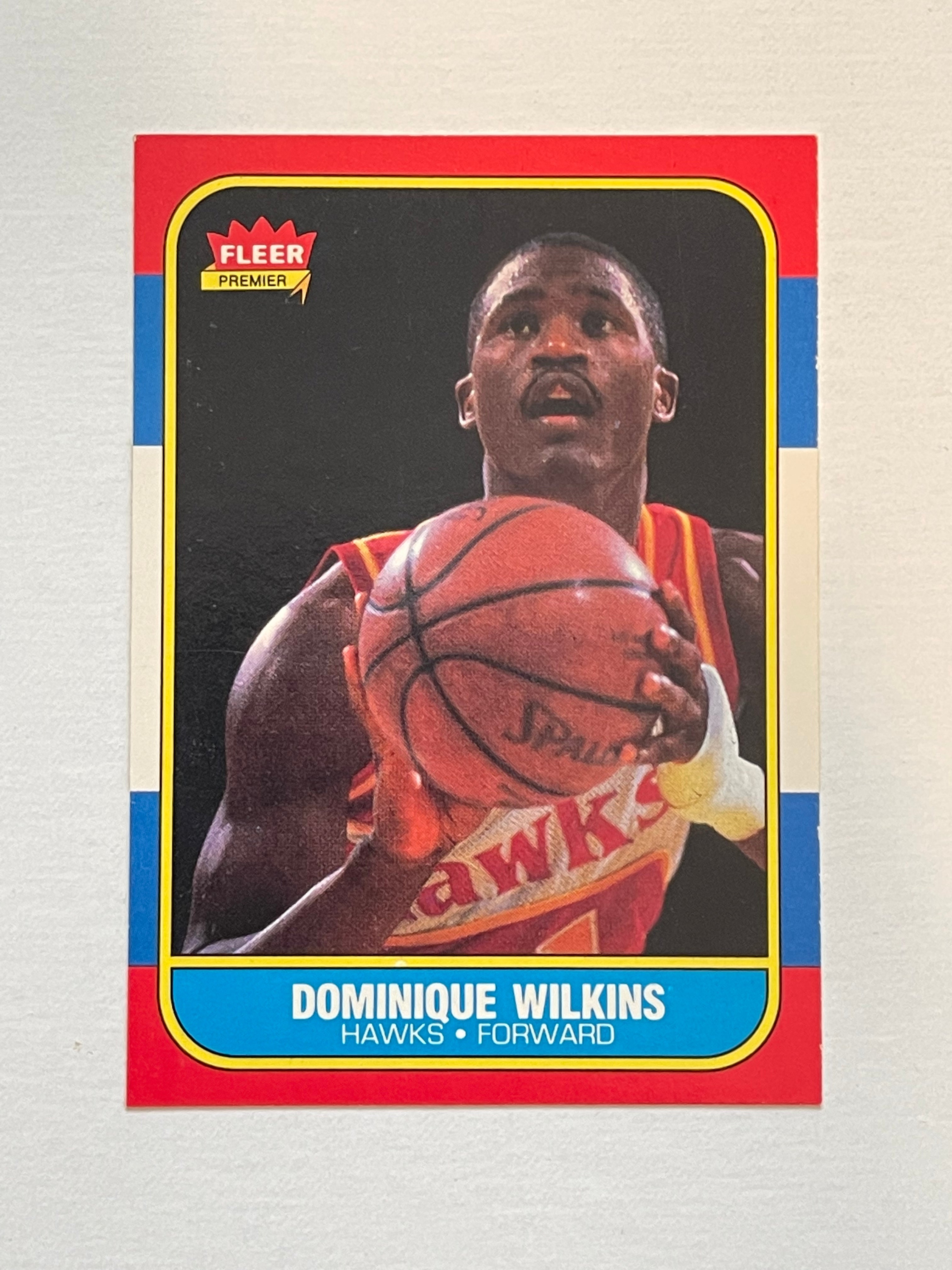 Dominique Wilkins 1986 Fleer Rookie Card PSA 7 - High Grade Basketball Trading Card for Collectors & Investors | Perfect for Sports Memorabilia Displays & Investment Portfolios