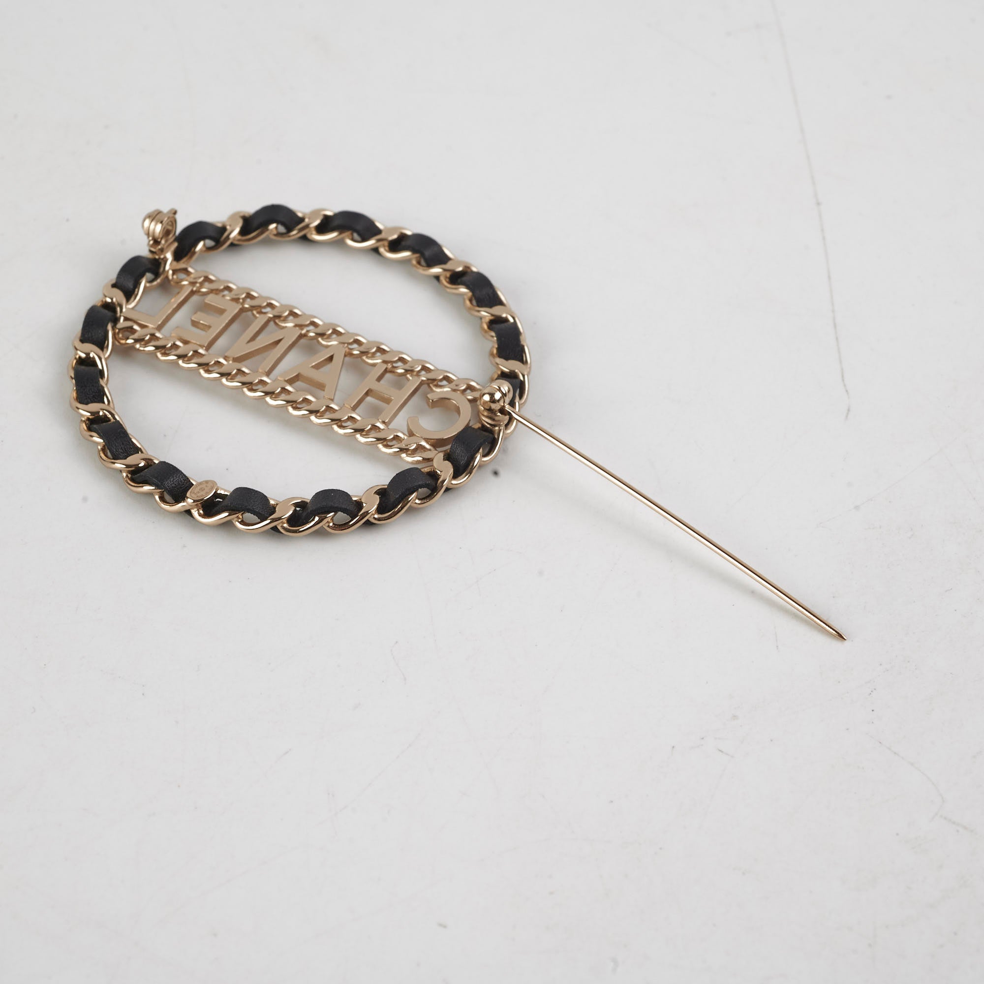 Chanel CC Round Black and Gold Brooch - Elegant Fashion Accessory for Women, Perfect for Dresses, Jackets, and Bags