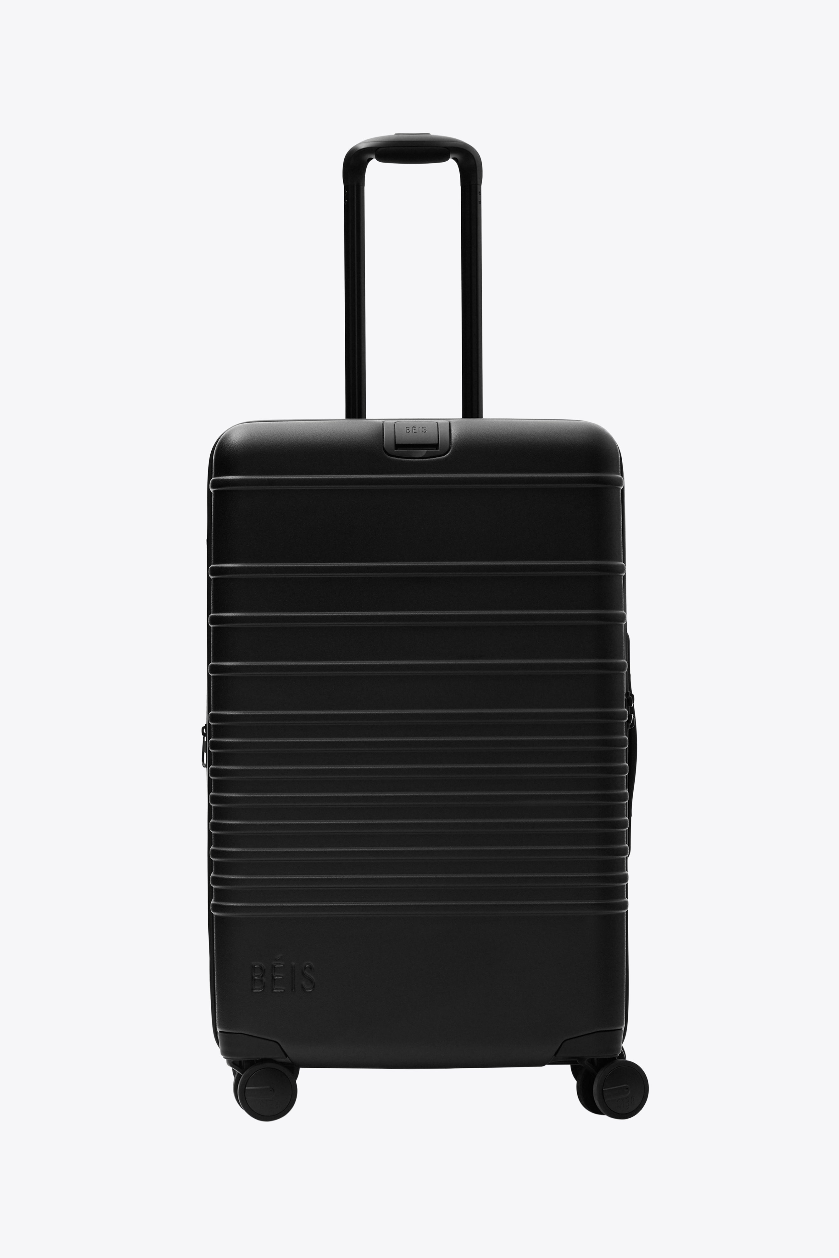 All Black Medium Check-In Roller Luggage - Perfect for Business Travel & Weekend Getaways