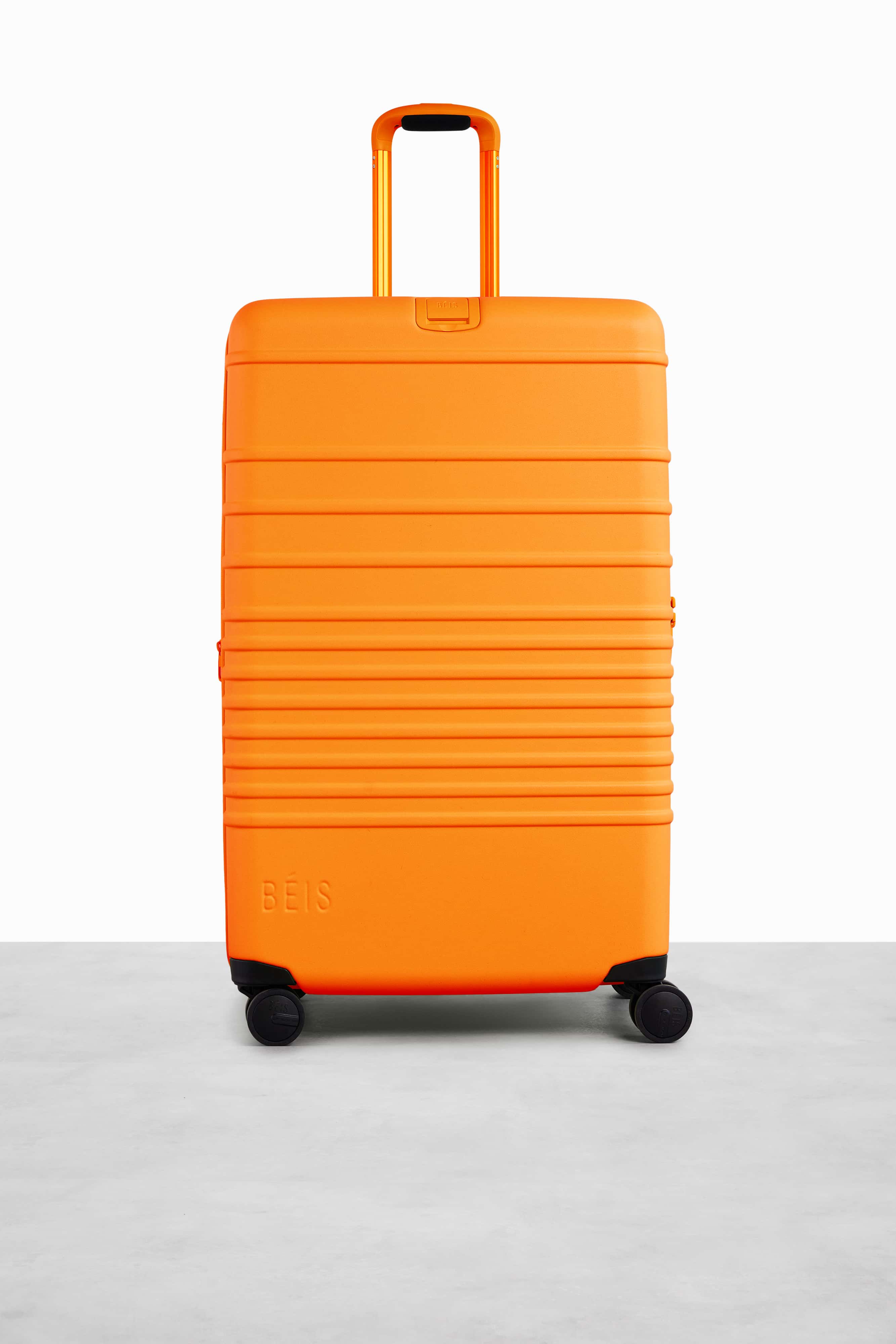 Large Check-In Roller Suitcase in Creamsicle - Spacious & Durable Travel Luggage for Airlines, Vacations & Business Trips
