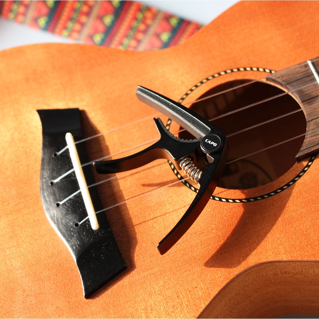 Premium Aluminum Alloy Ukulele Capo for Soprano/Concert/Tenor/Baritone - Lightweight 4-String Uke Clamp with Free Guitar Picks (Black) - Perfect for Live Performances, Practice & Travel