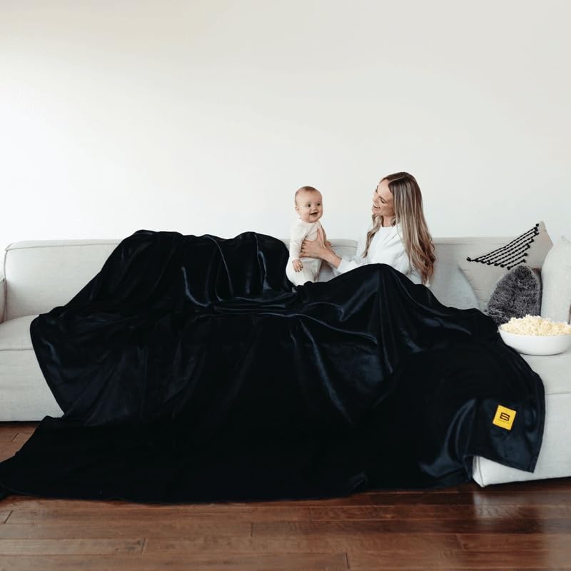 Big Blanket Co® Original Stretch™ Black - Extra Large 100 Sq Ft Soft Family Blanket | Giant Cozy Throw for Couples, Movie Nights & Outdoor Picnics | Best Oversized Blanket 2023