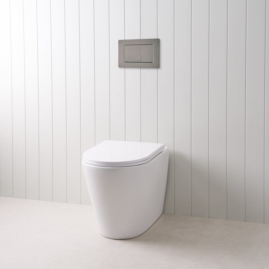 Angled In-Wall Toilet with Rectangle Gunmetal Buttons - Modern Space-Saving Bathroom Solution for Small Spaces and Contemporary Homes