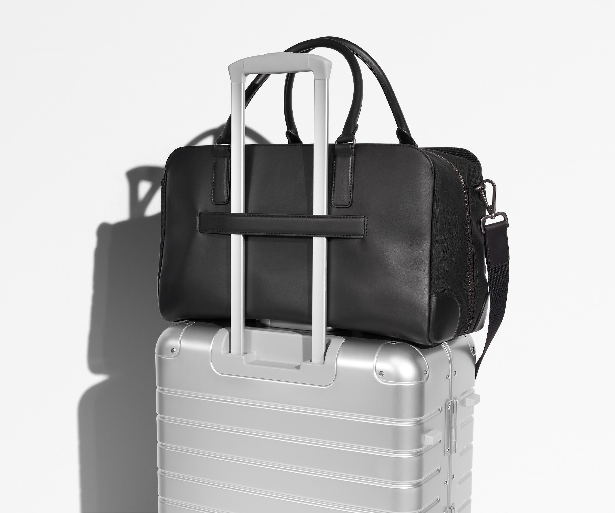 Premium Jet Black Leather Duffle Bag for Men & Women - Waterproof Travel Duffel with Shoulder Strap - Perfect for Gym, Business Trips & Weekend Getaways
