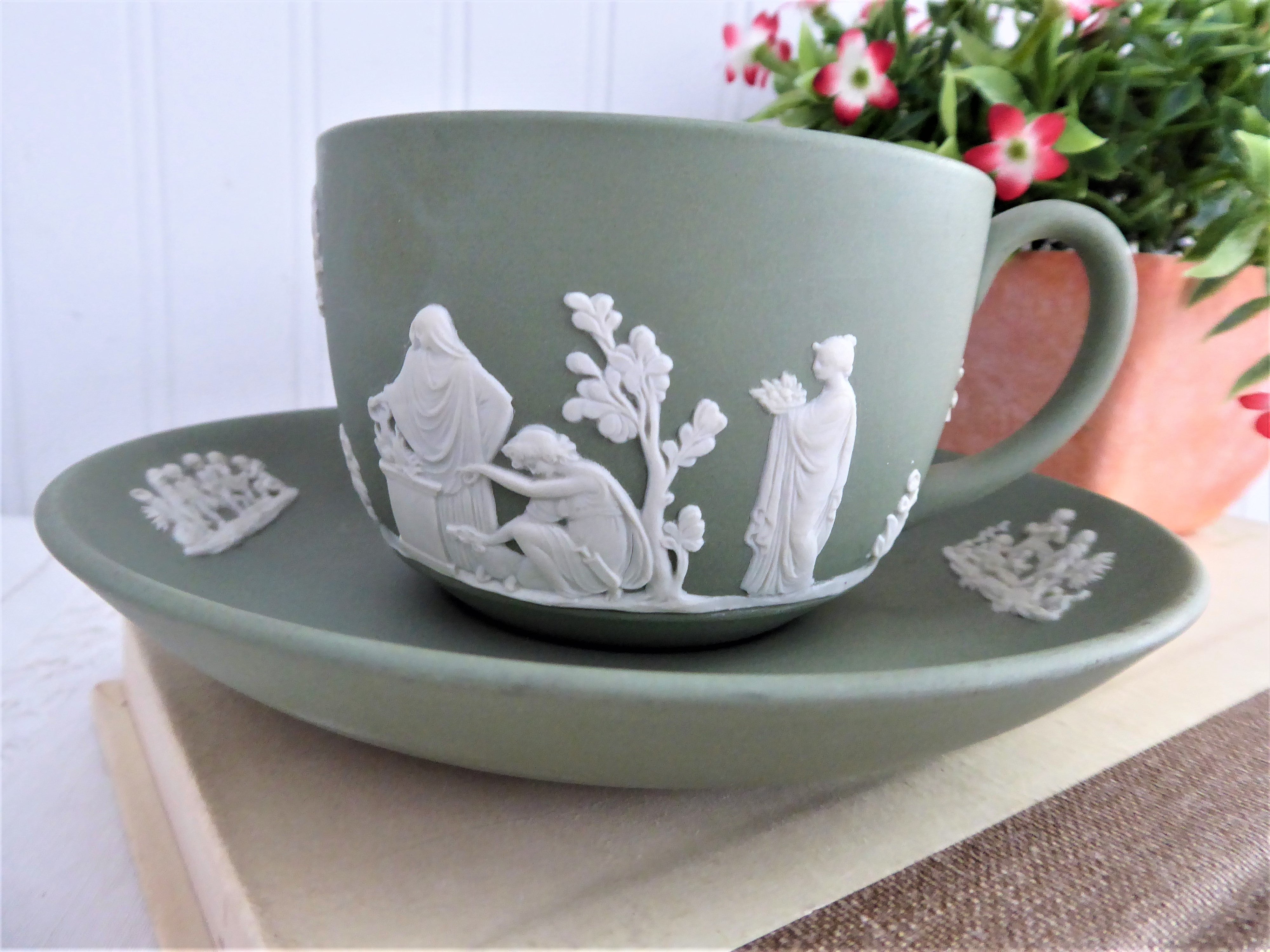 Vintage Wedgwood Green Jasperware Cup and Saucer Set with Cherub Sacrifice Figures - Made in England 1970s - Perfect for Tea Time, Collectible Display, and Wedgwood Enthusiasts