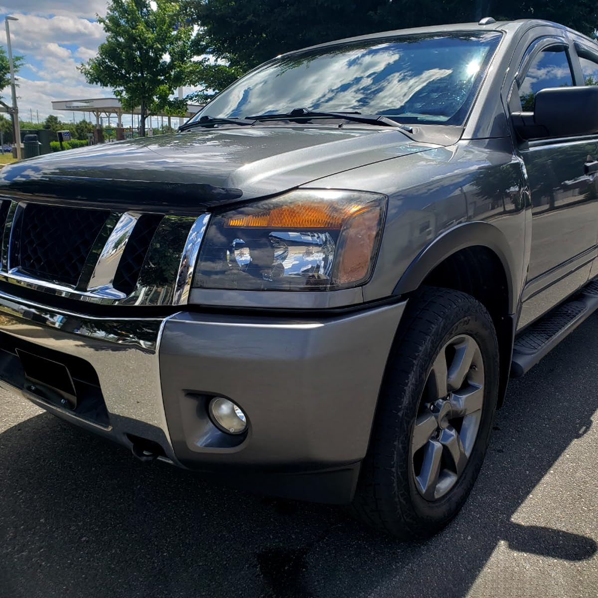 04-15 Nissan Titan & 04-07 Nissan Armada Black Headlights Pair - Durable LED Replacement Lamps for Off-Road & Night Driving