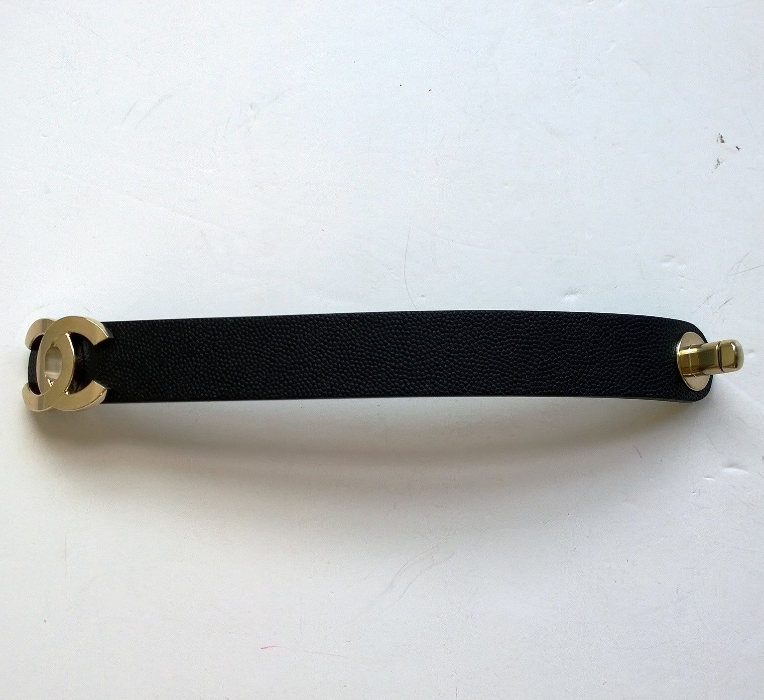 Chanel CC Cuff Bracelet in Black Leather with Gold Logo - Luxury Fashion Jewelry for Women - Perfect for Parties, Weddings & Special Occasions