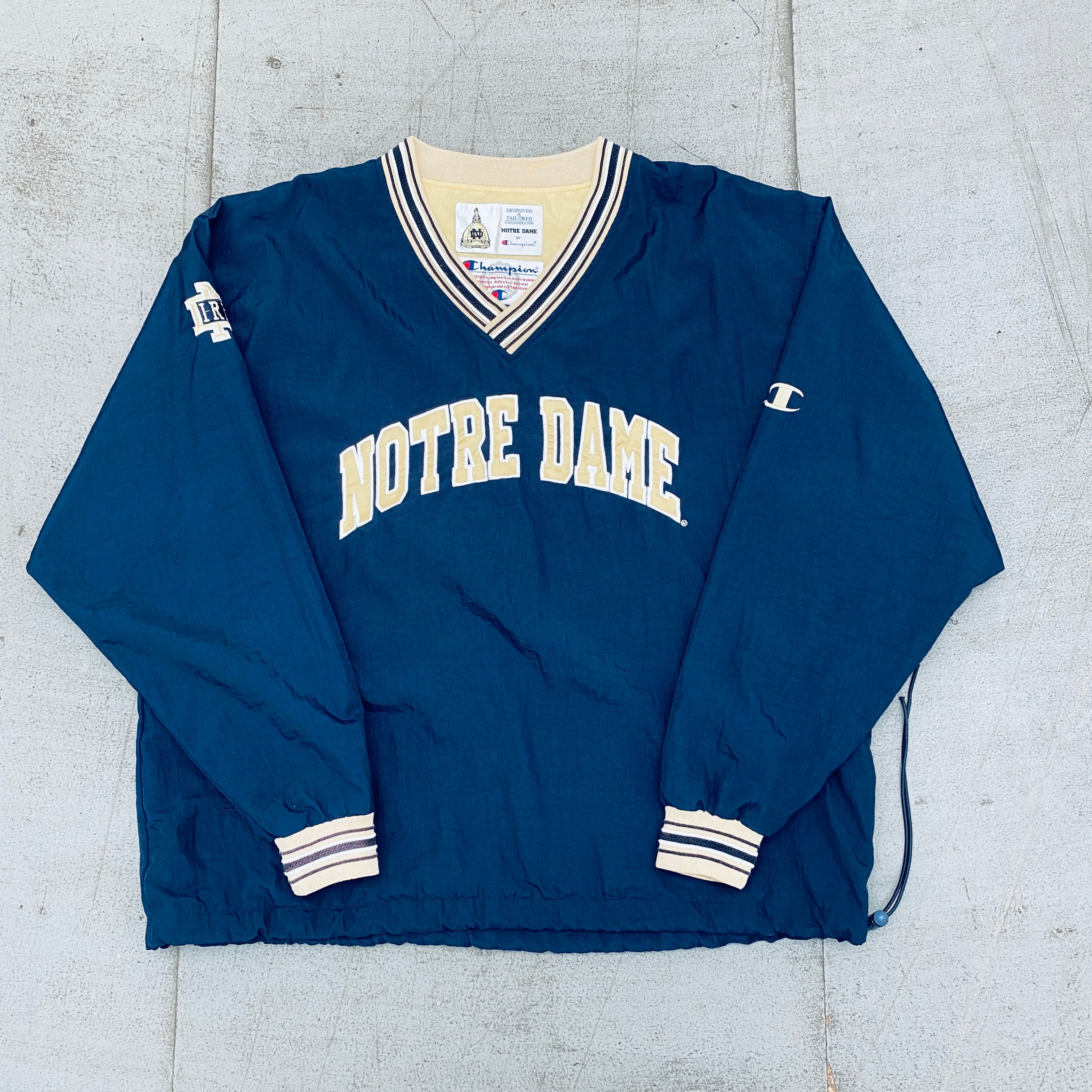 Notre Dame Fighting Irish 1990s Vintage Champion Spellout Sideline Jacket - XL Size | Retro College Football Apparel for Fans & Collectors | Perfect for Game Day, Tailgating & Sports Memorabilia Display