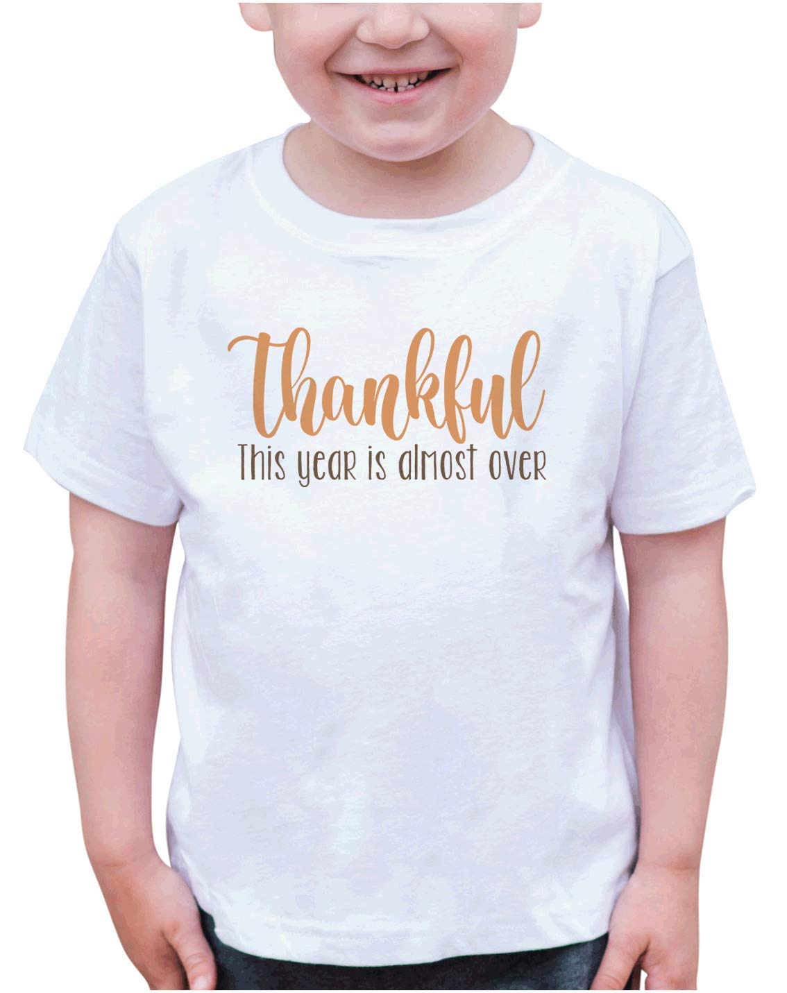 7 ate 9 Apparel Kids Thankful This Year is Almost Over T-Shirt | Funny Holiday Graphic Tee for Boys & Girls | Christmas, New Year Party Outfit