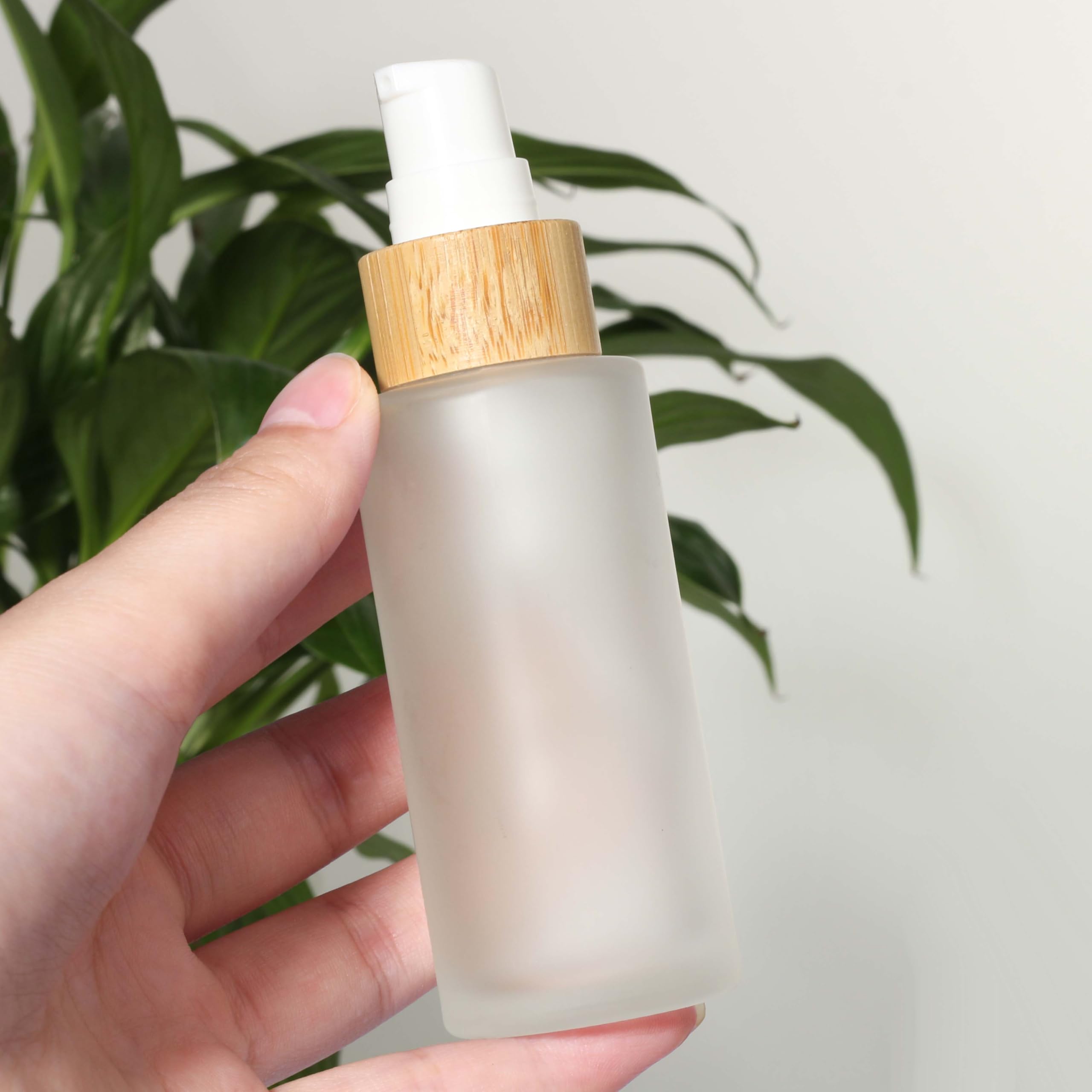 COSIDEA 6-Pack 1.67oz/50ml Refillable Bamboo Lid Frosted Glass Bottles with Lotion Pump - Travel-Sized Cosmetic Containers for Serum, Cream & Lotion | Perfect for Toiletries, Skincare & Travel Essentials
