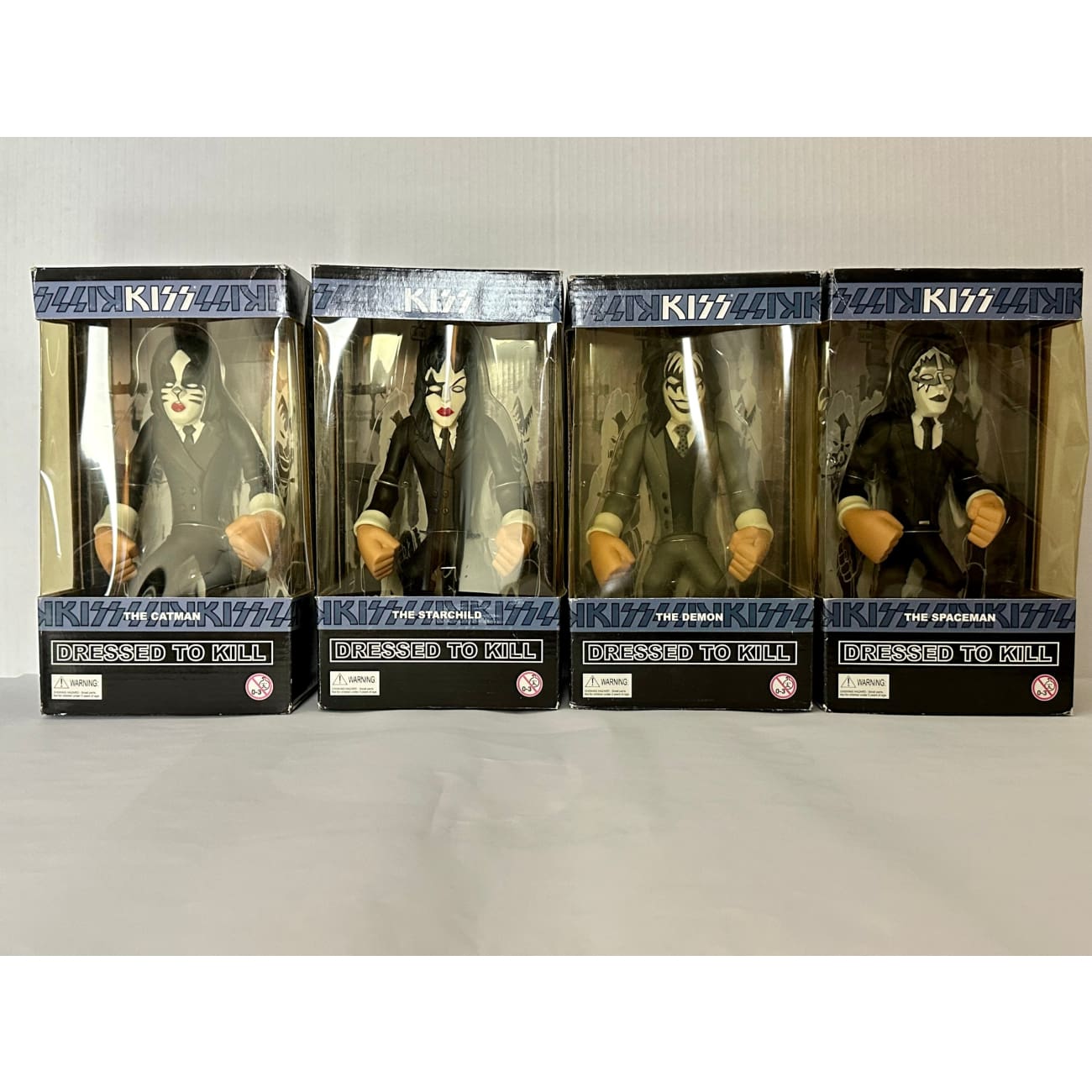 KISS Dressed To Kill Figurines - Complete Set of 4 Collectible Action Figures (2003) New in Original Box | Perfect for Rock Music Fans, KISS Memorabilia Collectors, and Home Decor Display