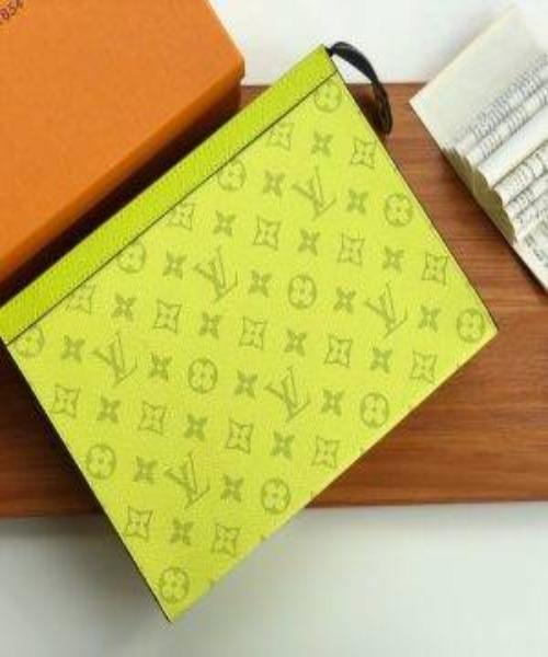 Authentic Louis Vuitton Pochette Voyage MM Monogram Canvas Handbag in Yellow - Perfect for Travel, Everyday Use & Luxury Fashion Accessories