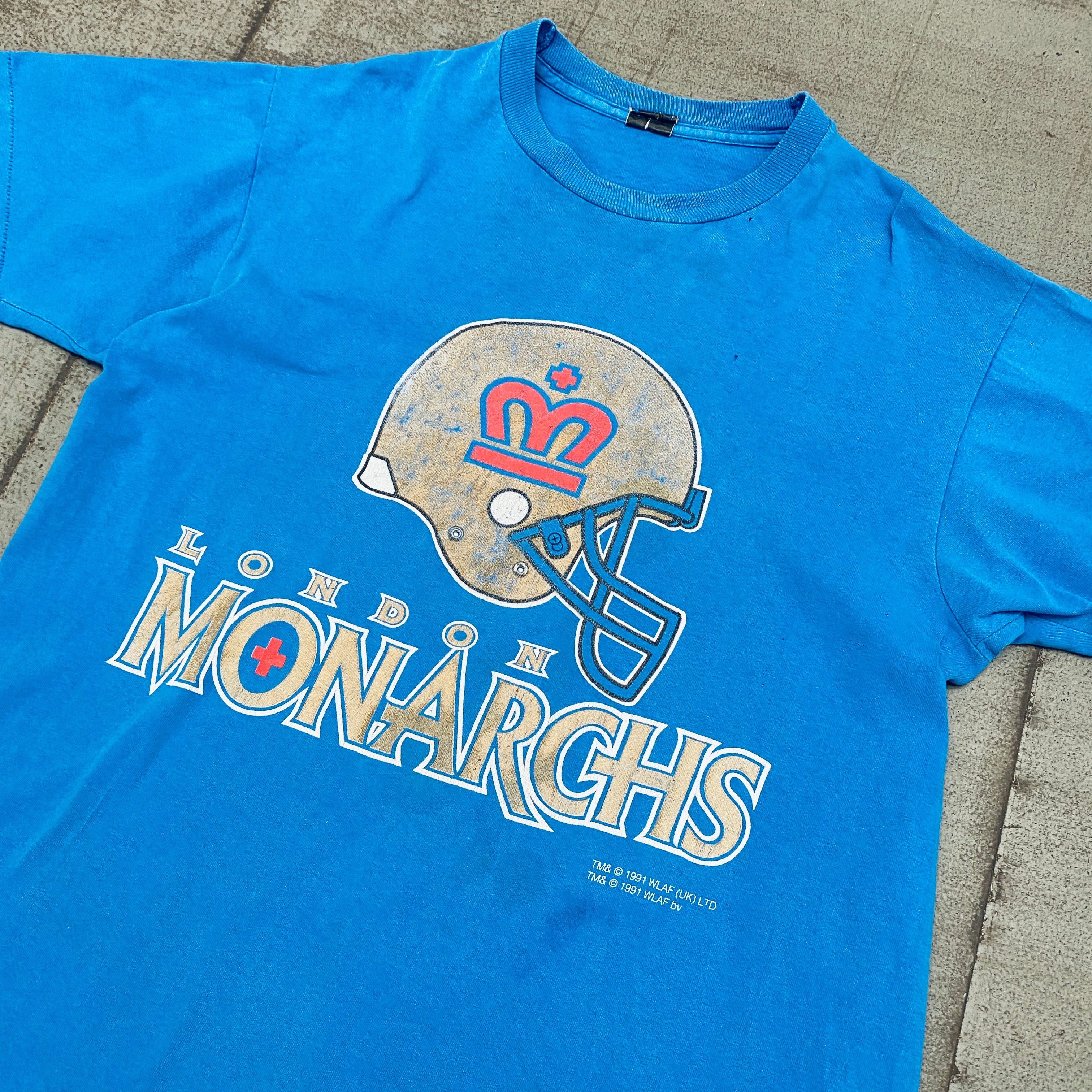 WLAF: Vintage 1991 London Monarchs Graphic Spellout T-Shirt (Large) - Retro Football Fan Apparel for Game Day & Casual Wear