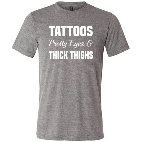 Unisex Tattoos Pretty Eyes Thick Thighs Graphic T-Shirt - Trendy Streetwear for Casual Outfits & Music Festivals