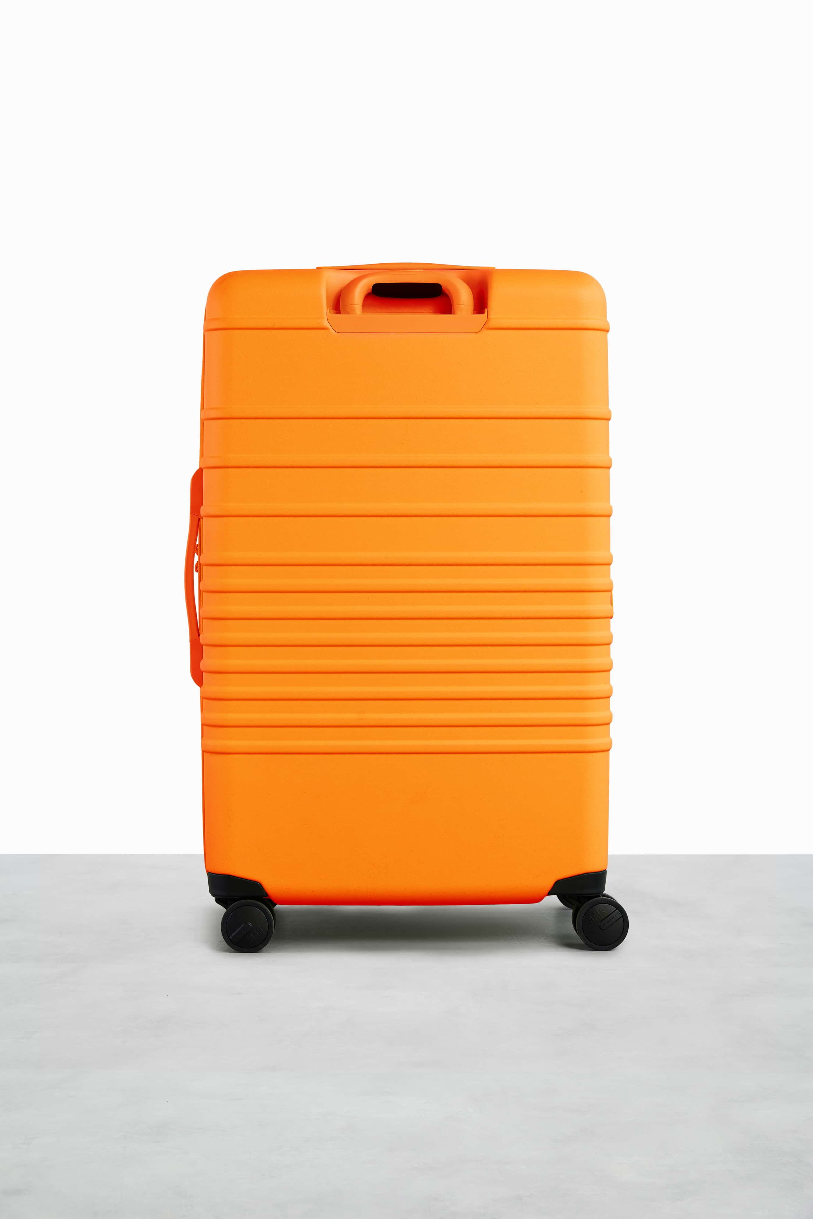Large Check-In Roller Suitcase in Creamsicle - Spacious & Durable Travel Luggage for Airlines, Vacations & Business Trips