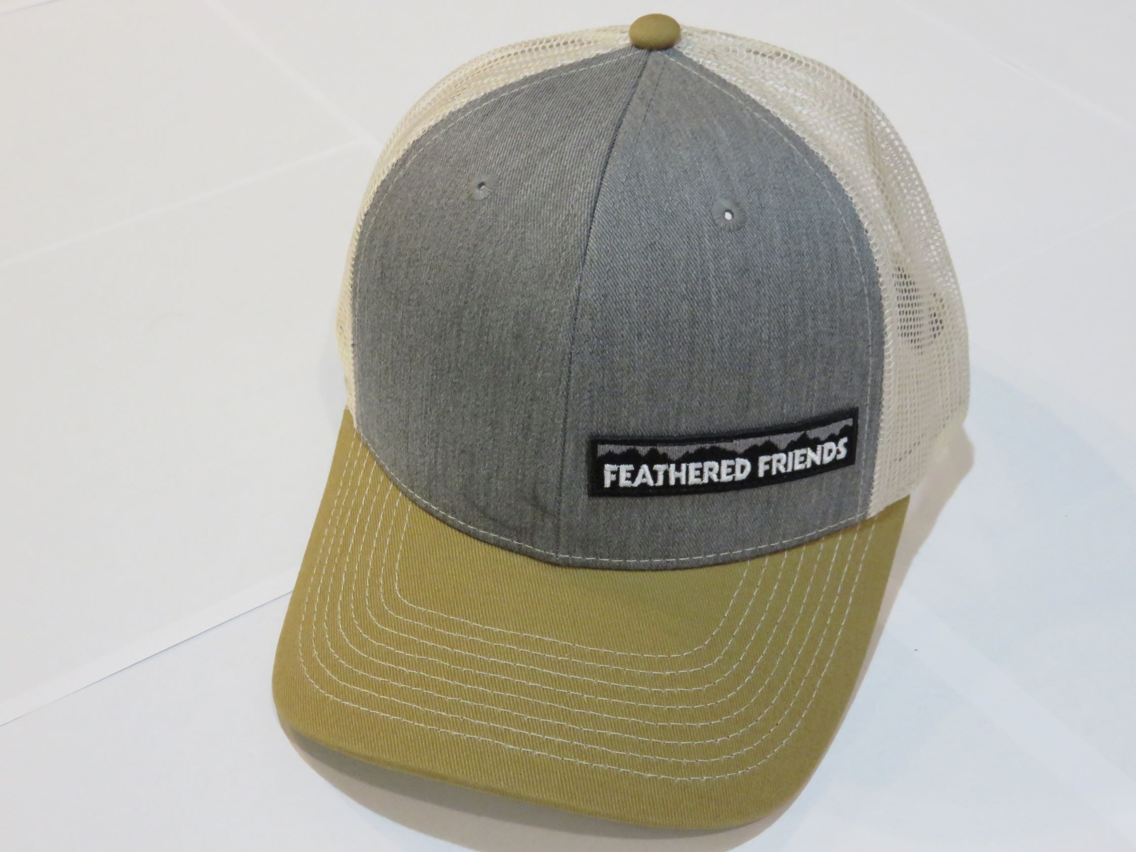 Feathered Friends Pro Style Trucker Offset Mountain Logo Patch Hat - Stylish Adjustable Cap for Outdoor Adventures, Hiking & Casual Wear