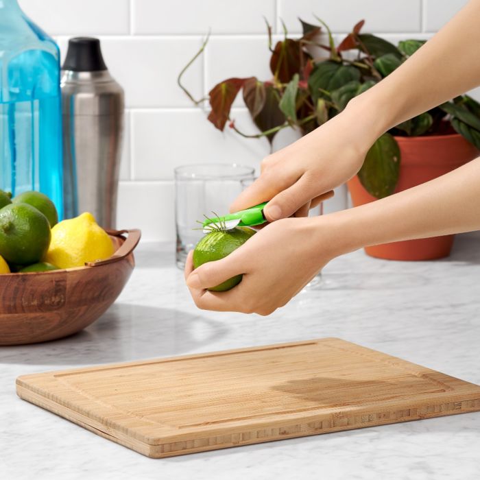 OXO Citrus Peeler - Stainless Steel Lemon & Orange Peeler - Easy Grip Kitchen Tool for Peeling Fruits - Perfect for Juicing, Cooking & Baking