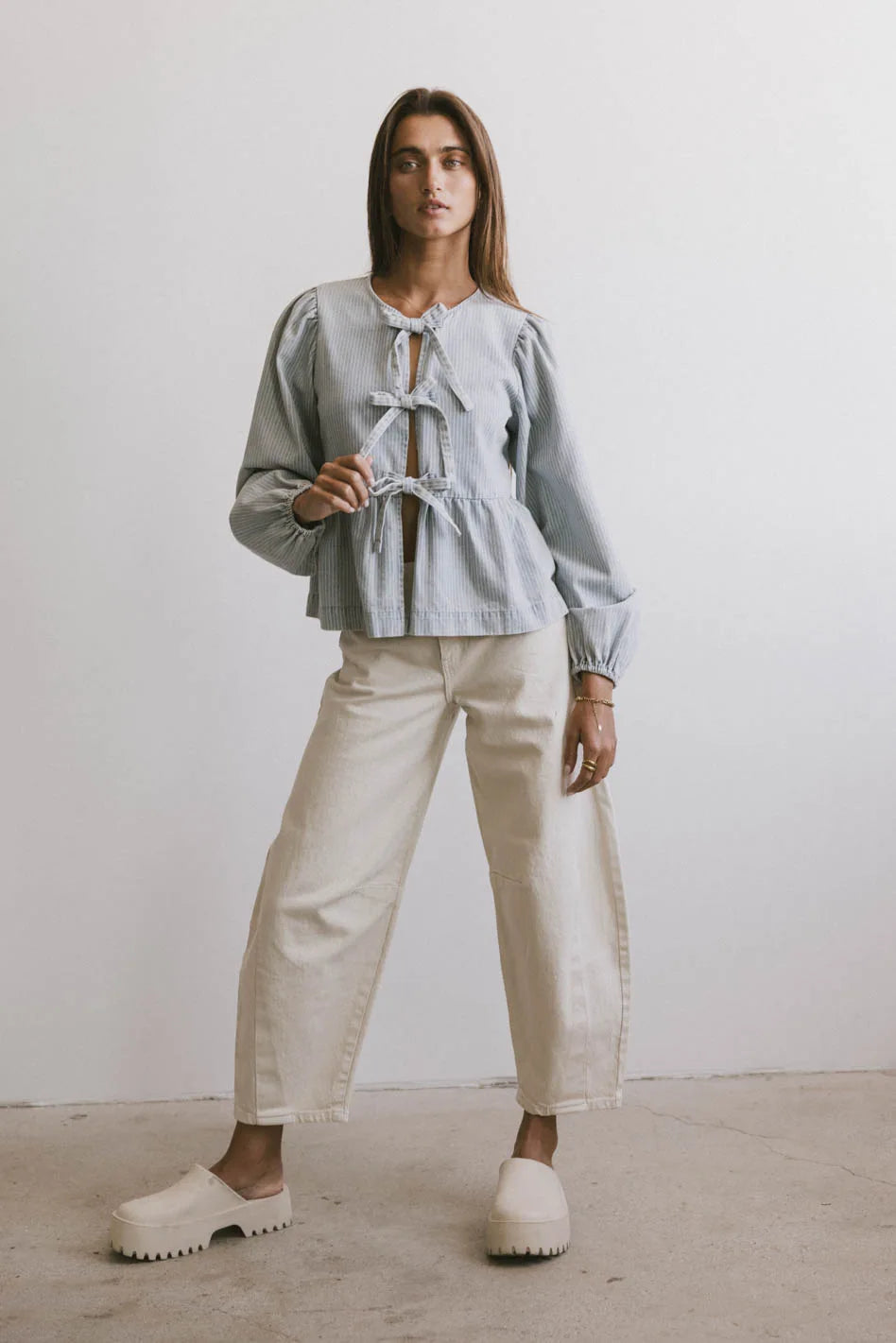 Elegant Maggie Peplum Tie Blouse in Light Wash - Women's Casual & Office Wear - Perfect for Work, Dates & Special Occasions