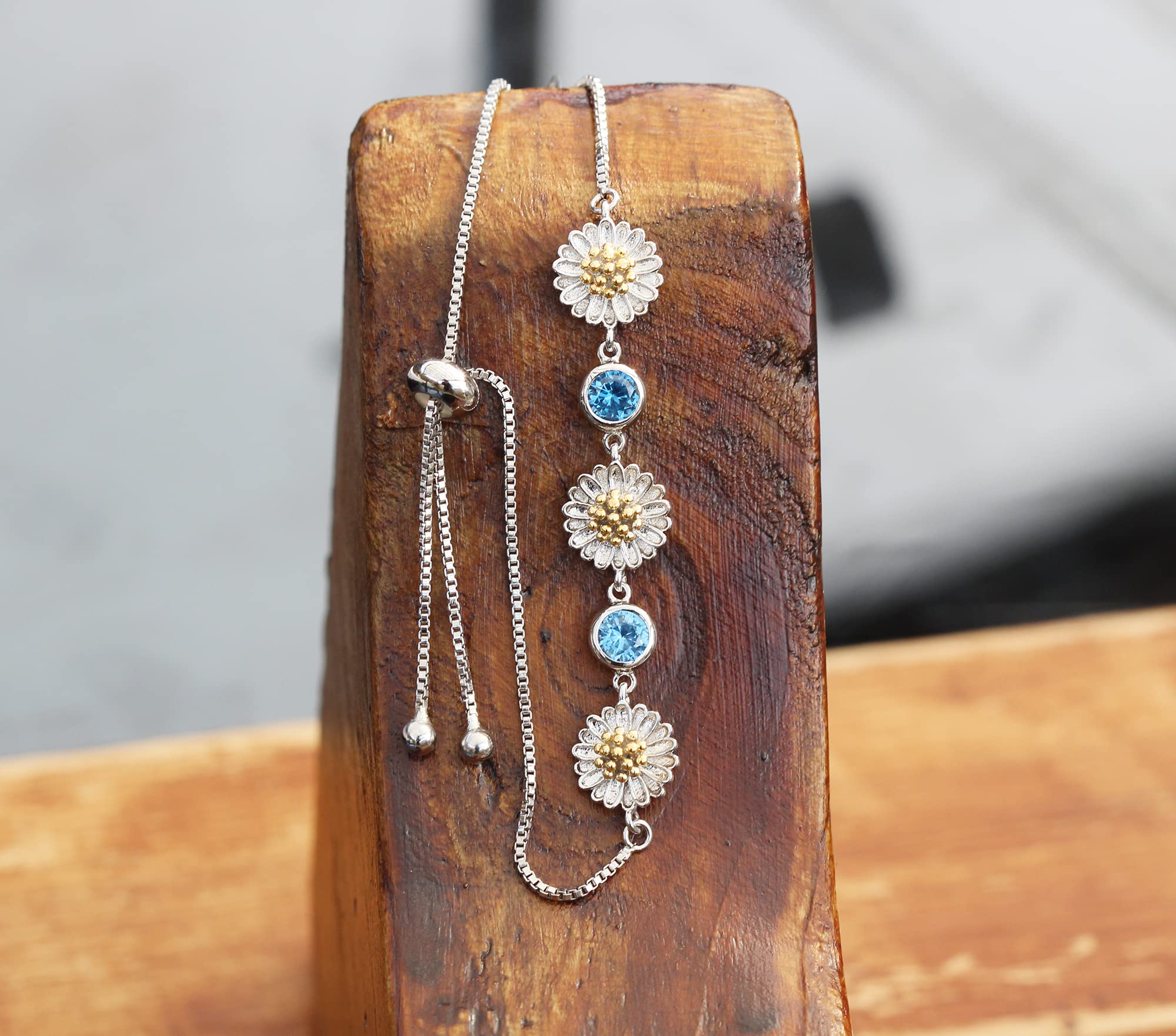 Kaguya Sterling Silver Daisy Bracelet for Women - Adjustable Infinity Bracelet with Blue Zirconia Blossom, Dainty Friendship Jewelry Gift for Her - Perfect for Birthday, Anniversary & Everyday Wear